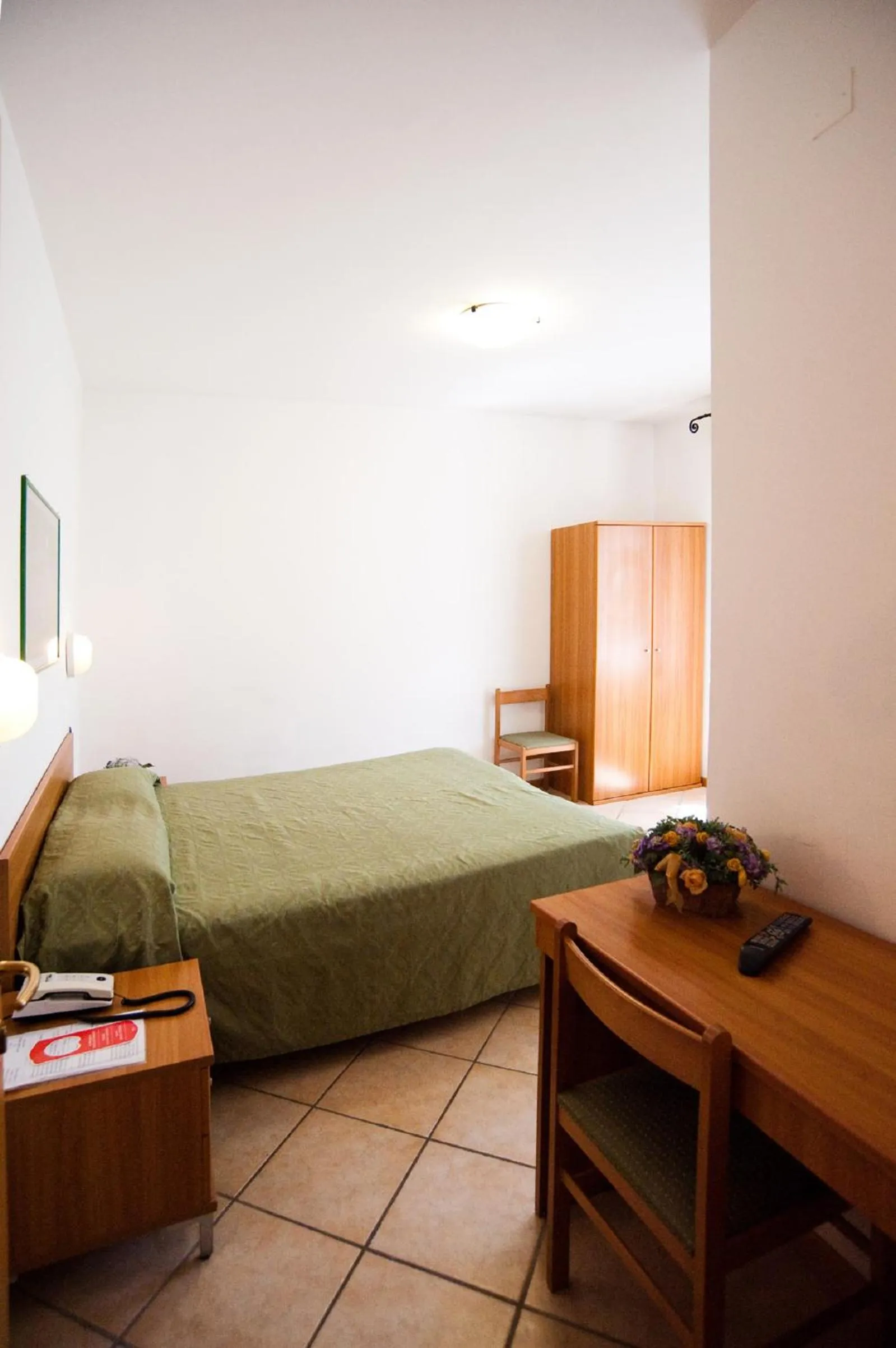 Bedroom, Bed in Hotel La Toscana
