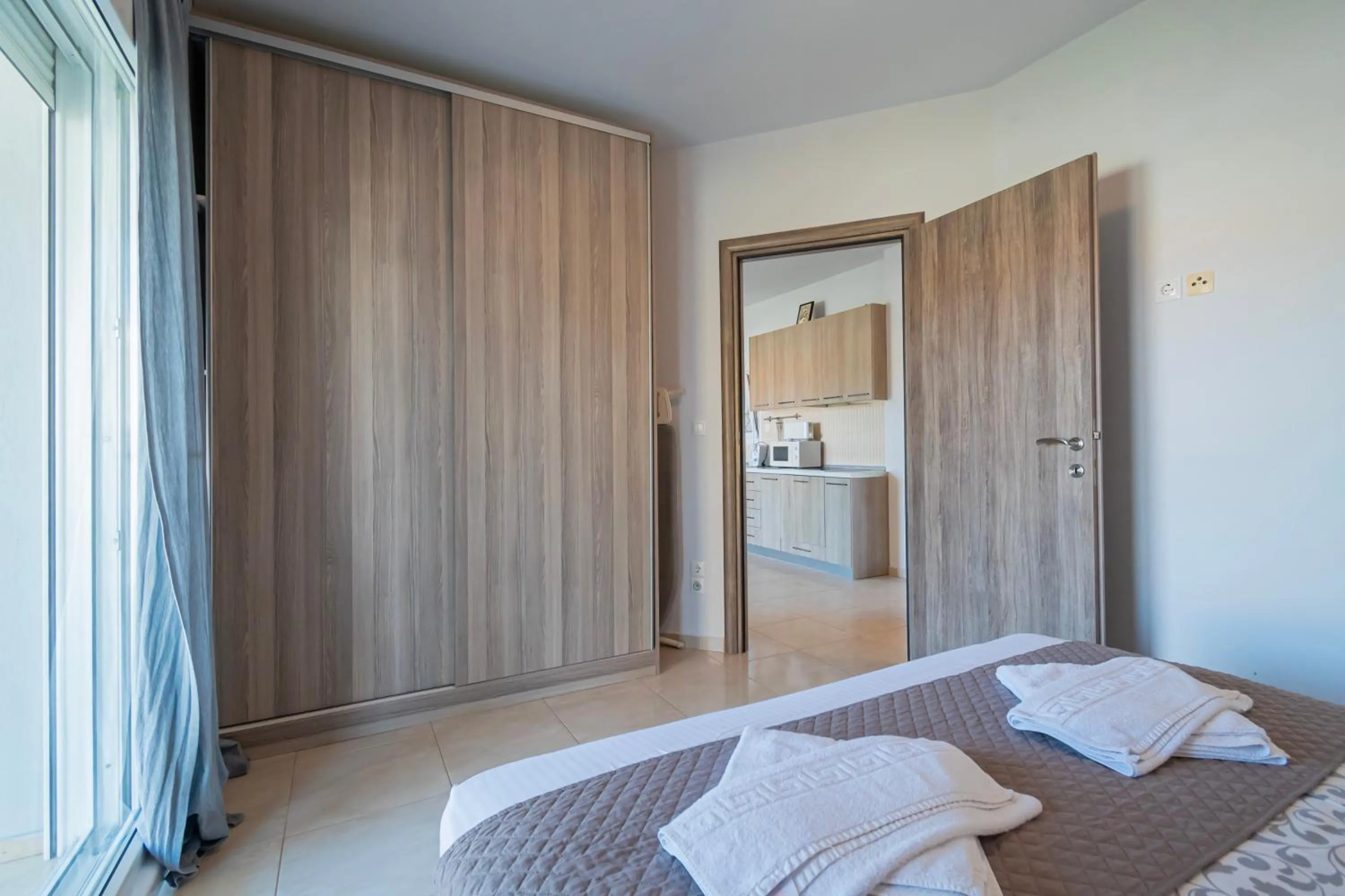 Bedroom, Bed in EllinFos Apartments