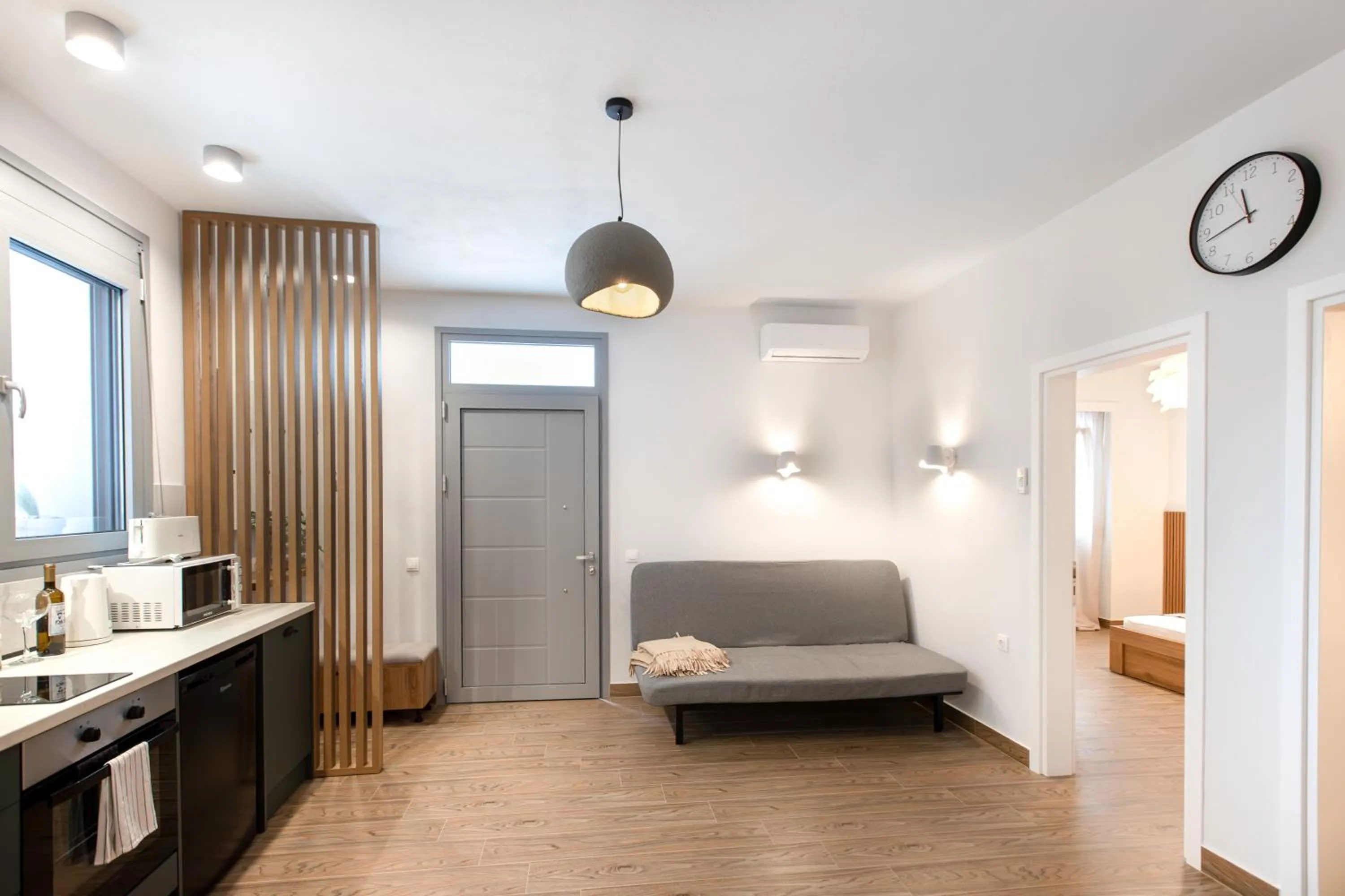Kitchen or kitchenette, Bed in EllinFos Apartments