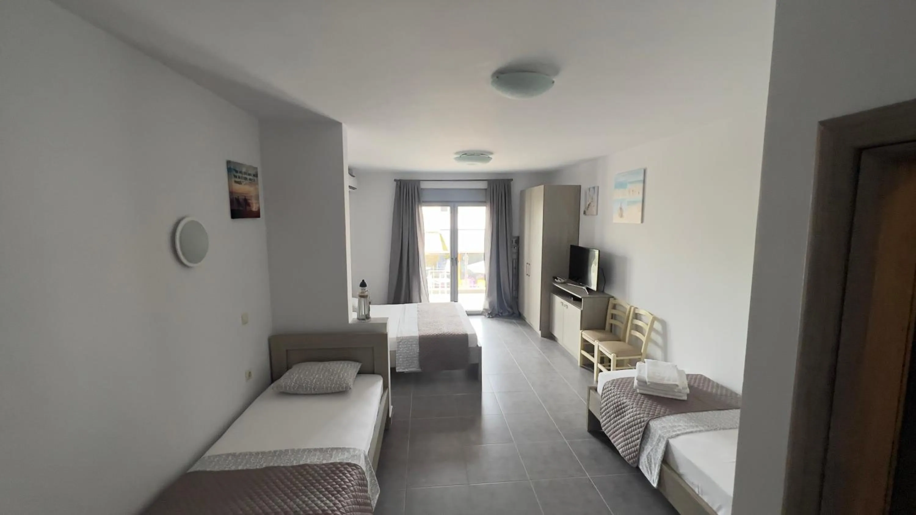 TV and multimedia, Bed in EllinFos Apartments