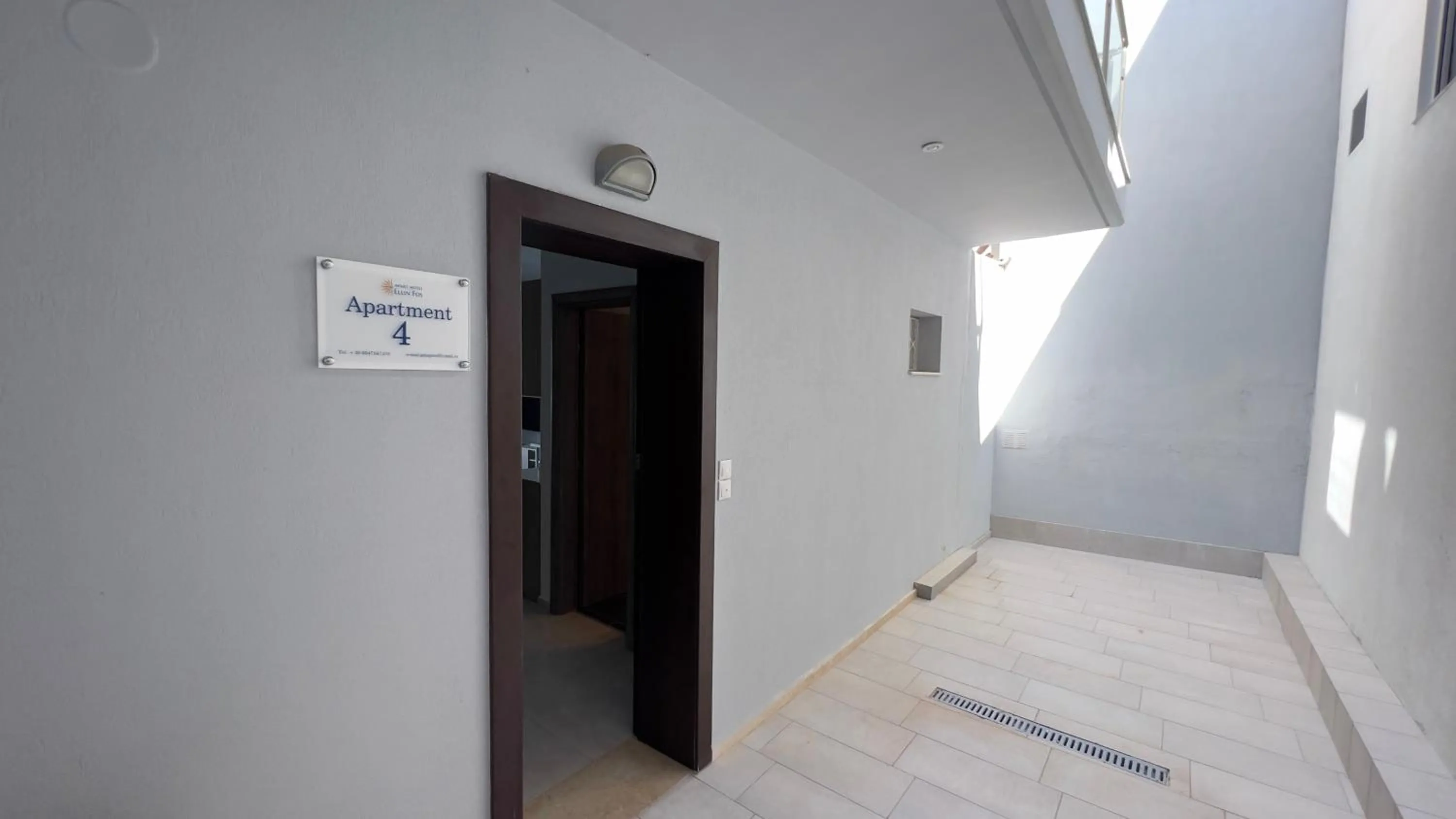 Facade/entrance, Bed in EllinFos Apartments