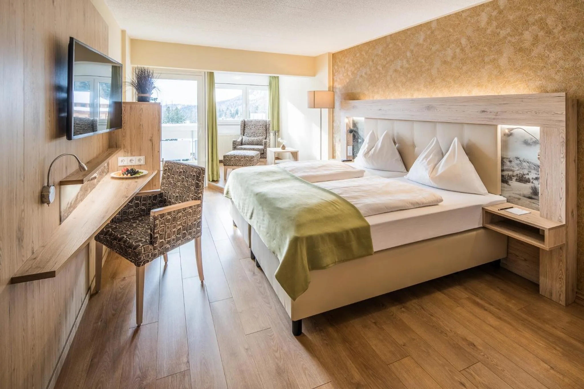 Seating area, Bed in Panorama Hotel Turracher Höhe