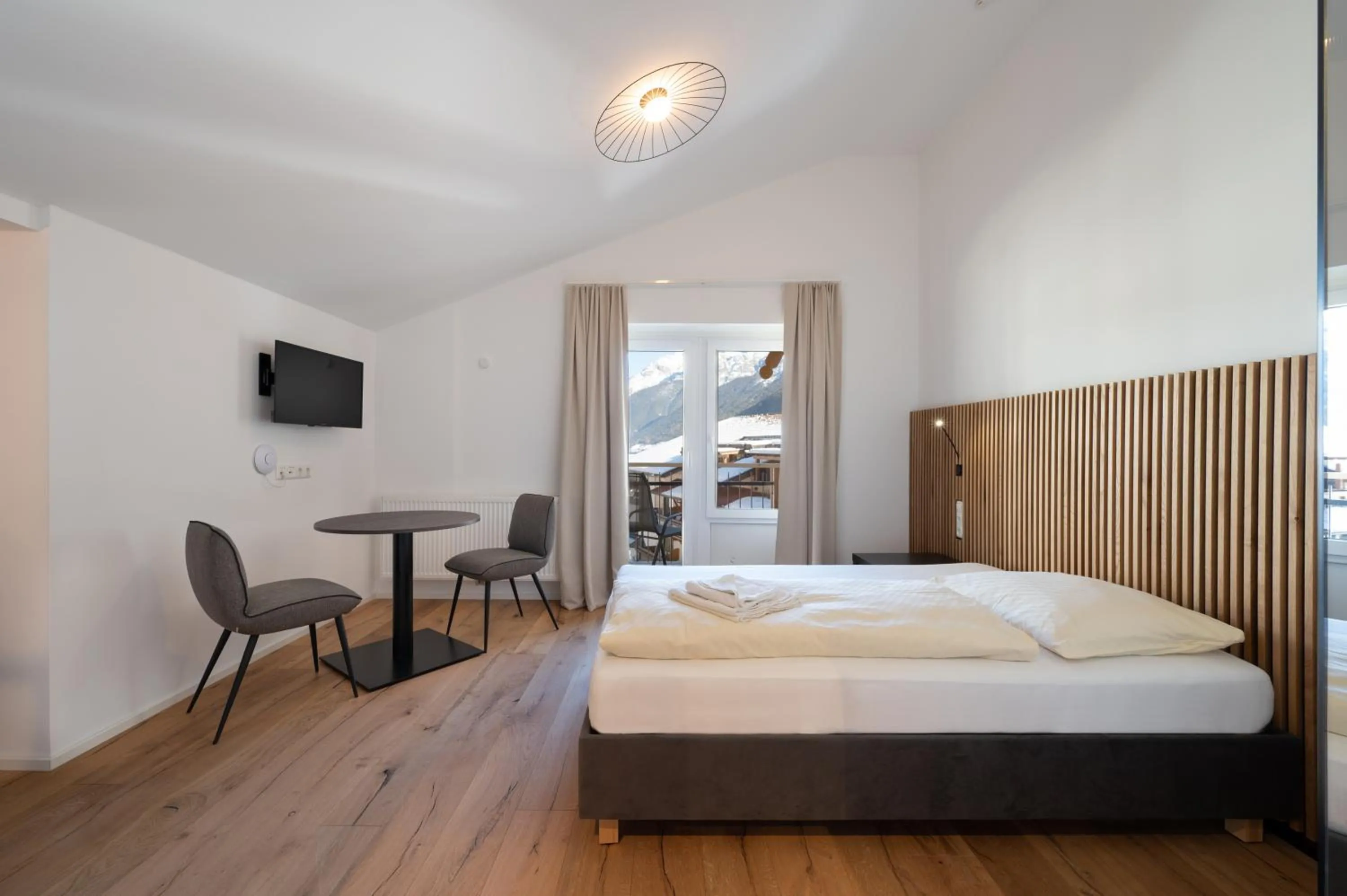 Photo of the whole room, Bed in Appartements zur Sonne