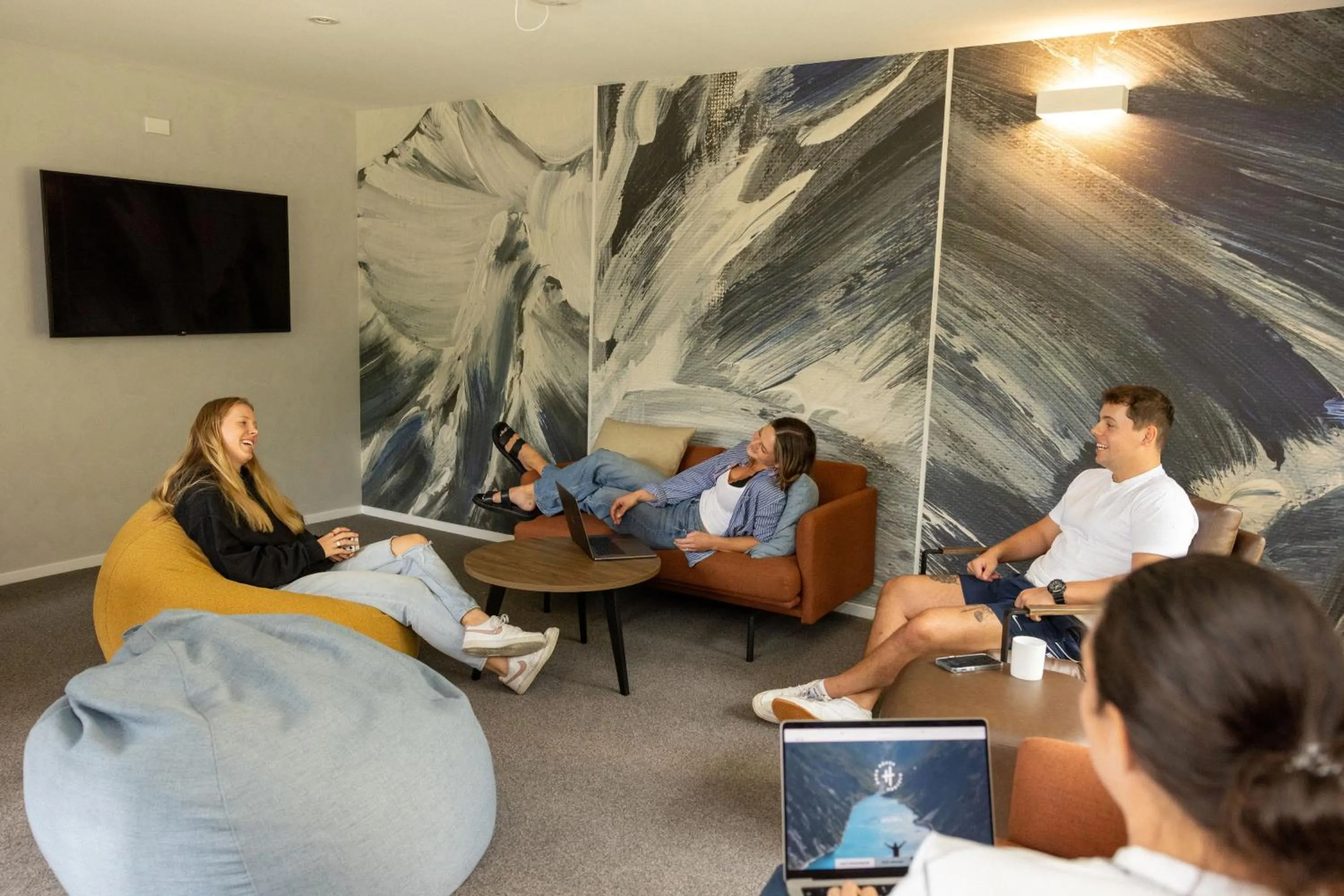 Communal lounge/ TV room in Haka House Franz Josef
