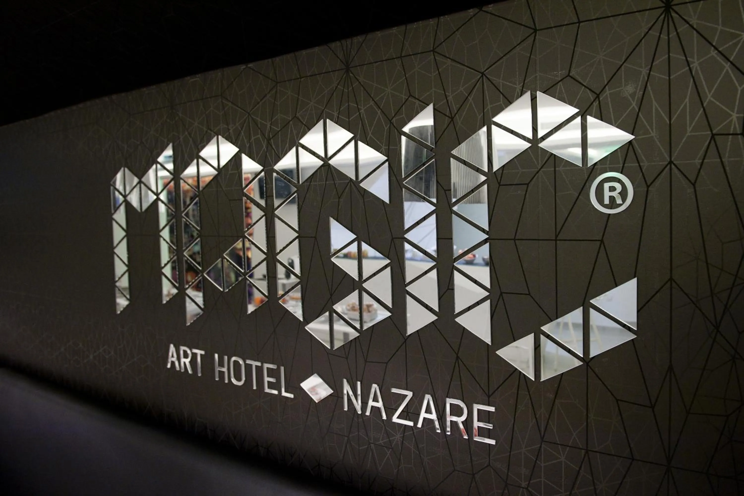 Property logo or sign in Hotel Magic