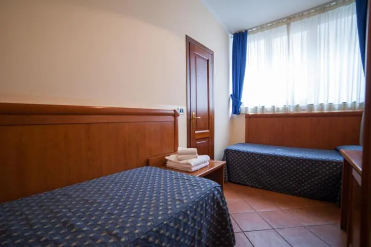 Photo of the whole room, Bed in Nights In Rome
