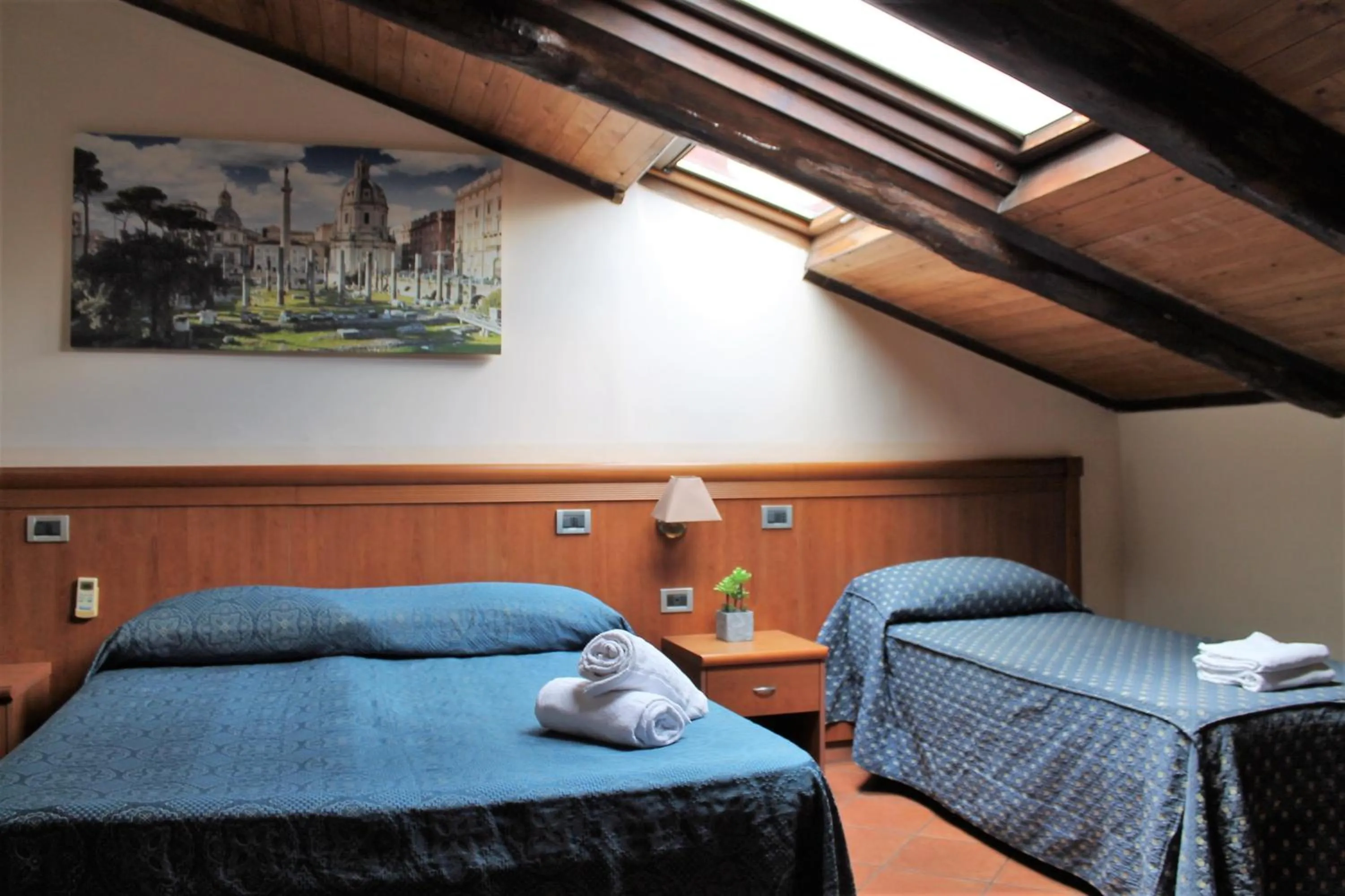 Photo of the whole room, Bed in Nights In Rome