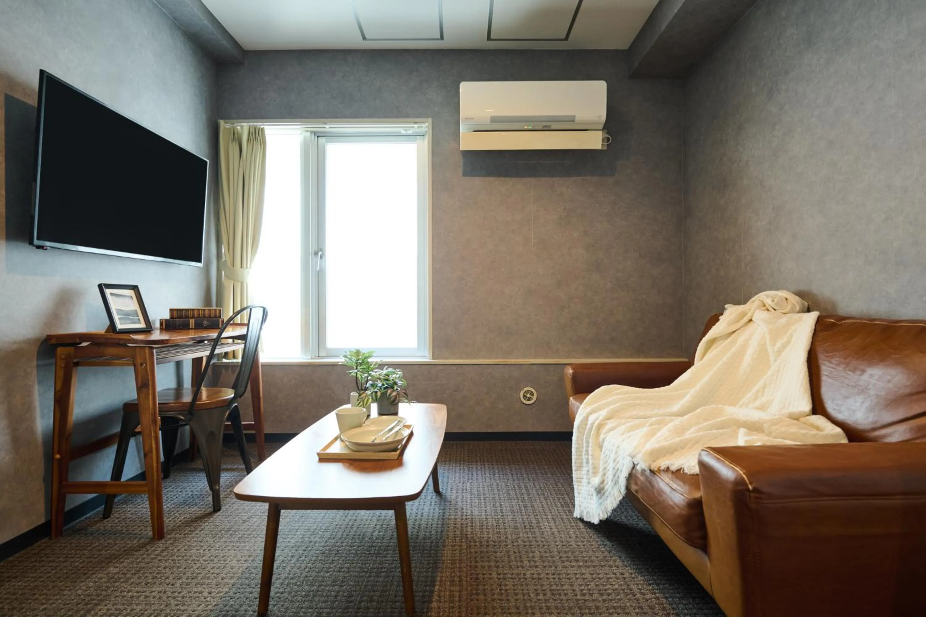 Bed in Residence Hotel Stripe Sapporo