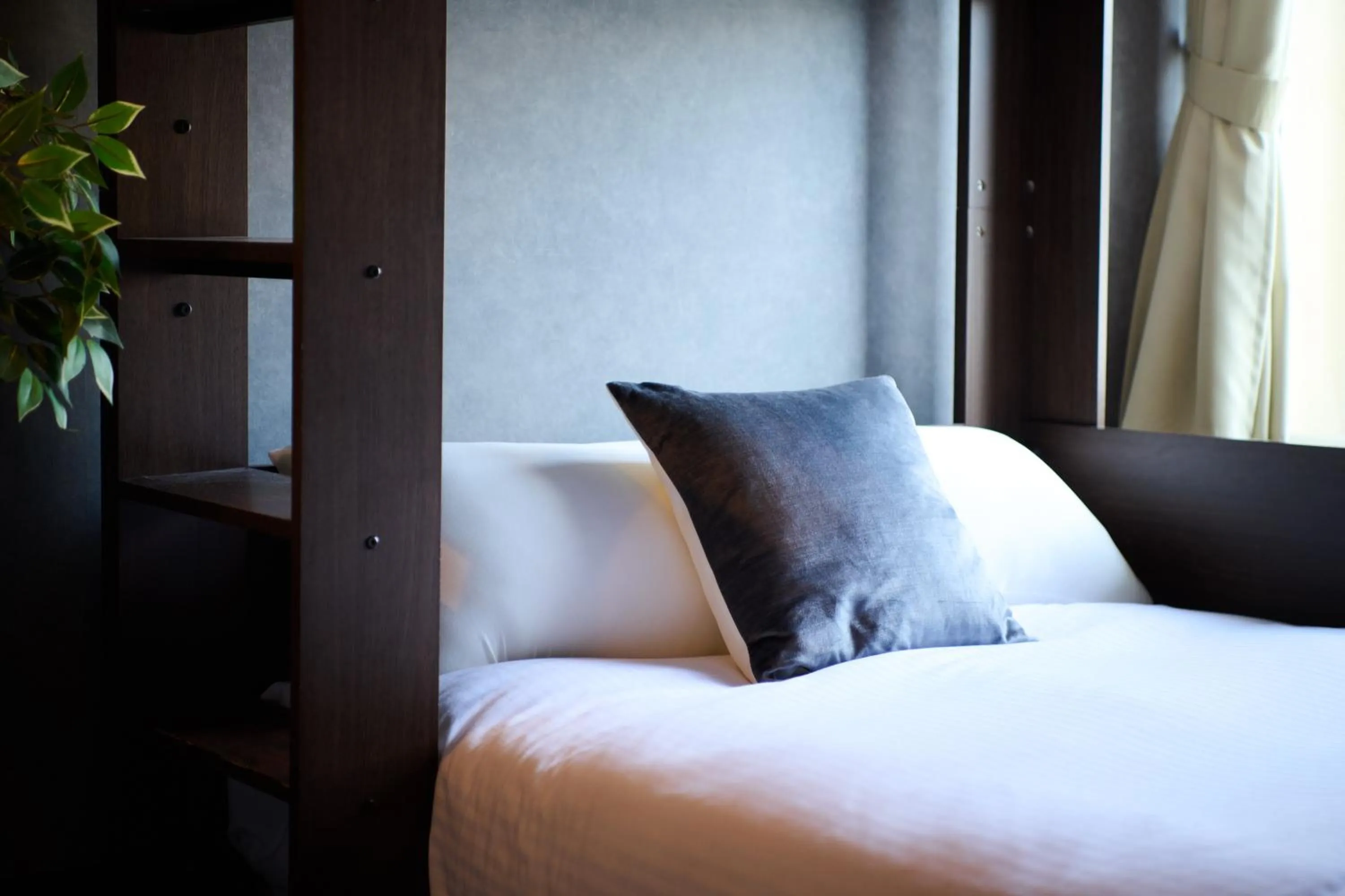 Bed in Residence Hotel Stripe Sapporo