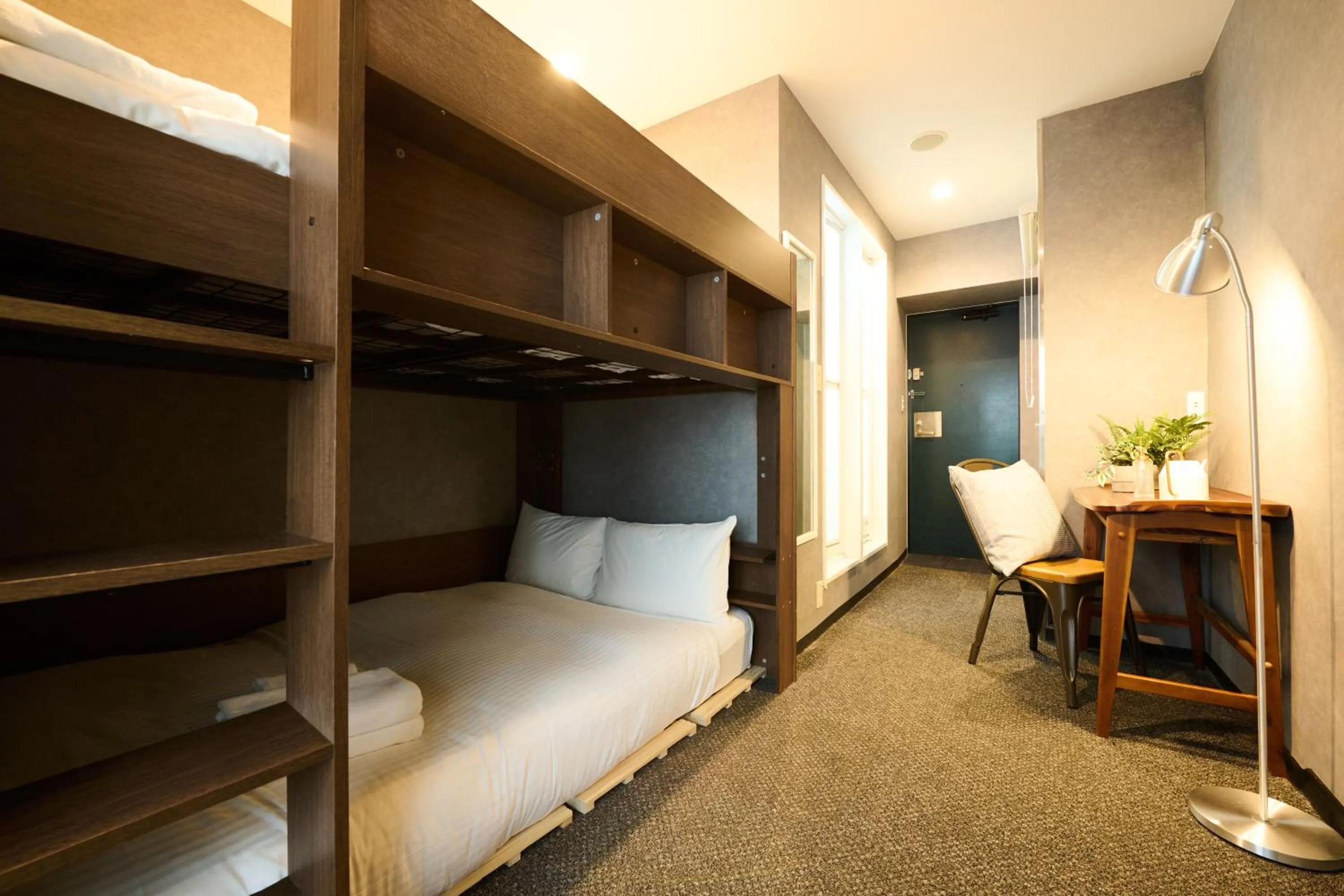 Bed in Residence Hotel Stripe Sapporo