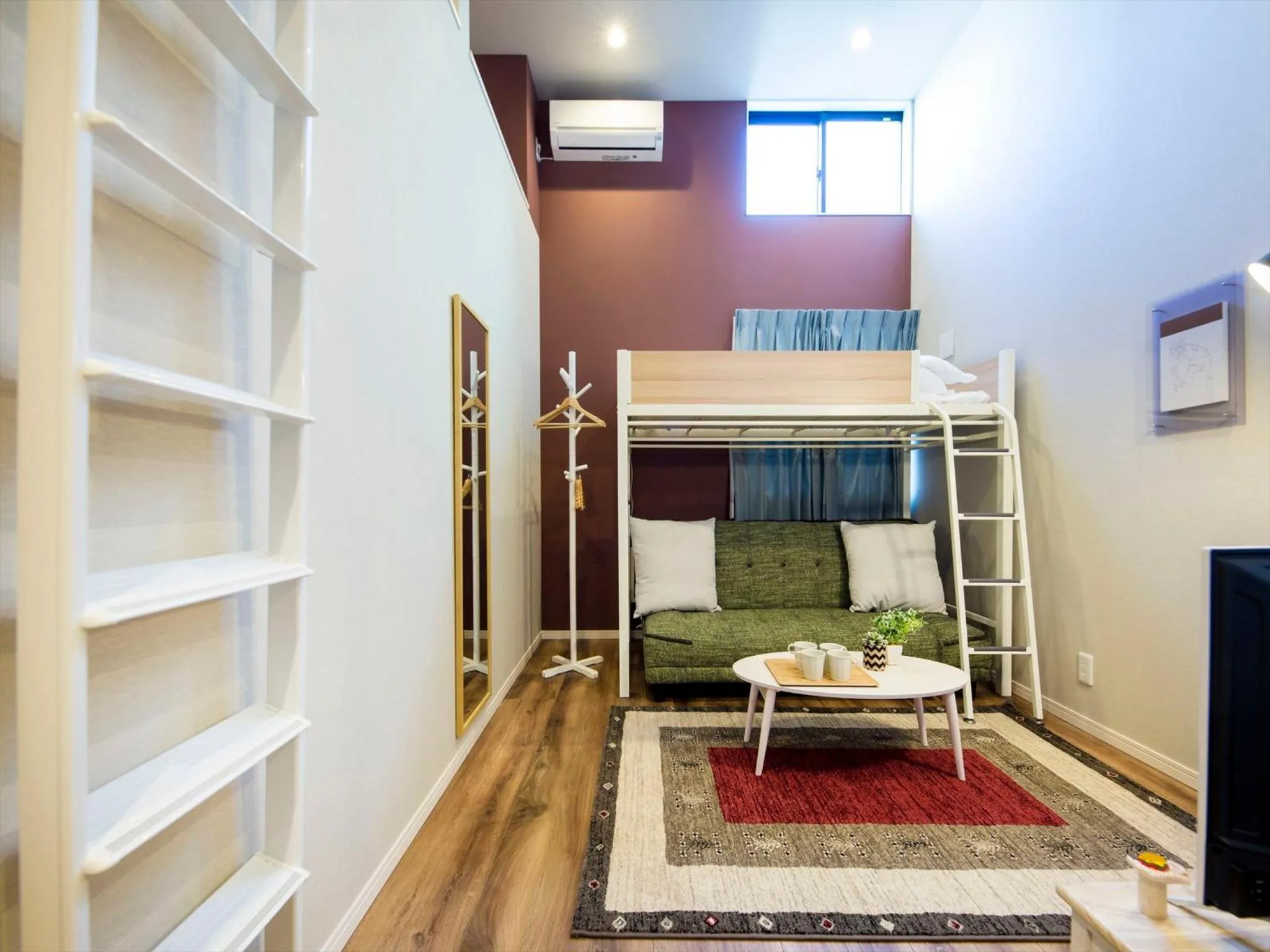 Living room, Bed in TRIP POD CHIYO A