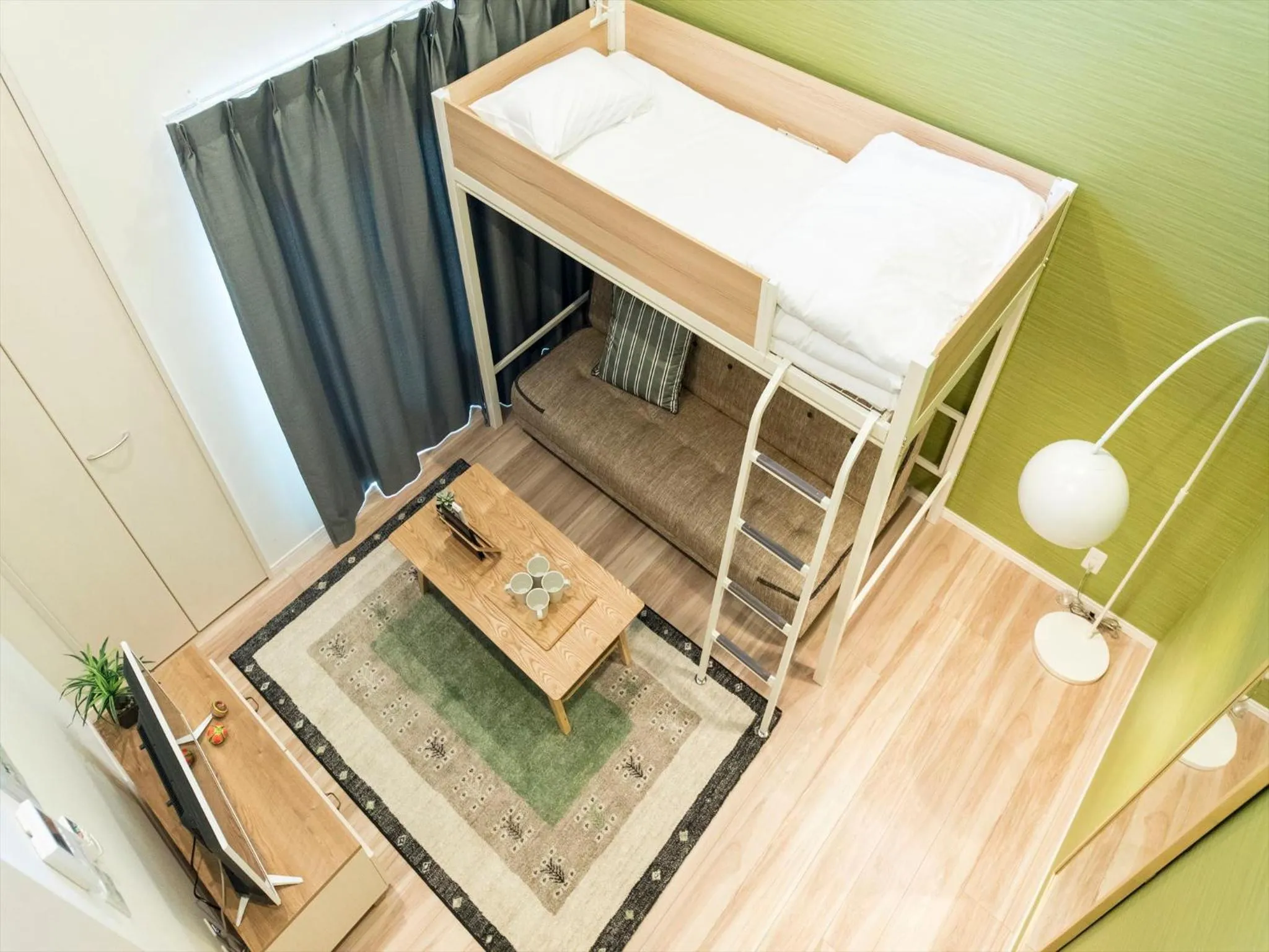 Living room, Bed in TRIP POD MINOSHIMA A