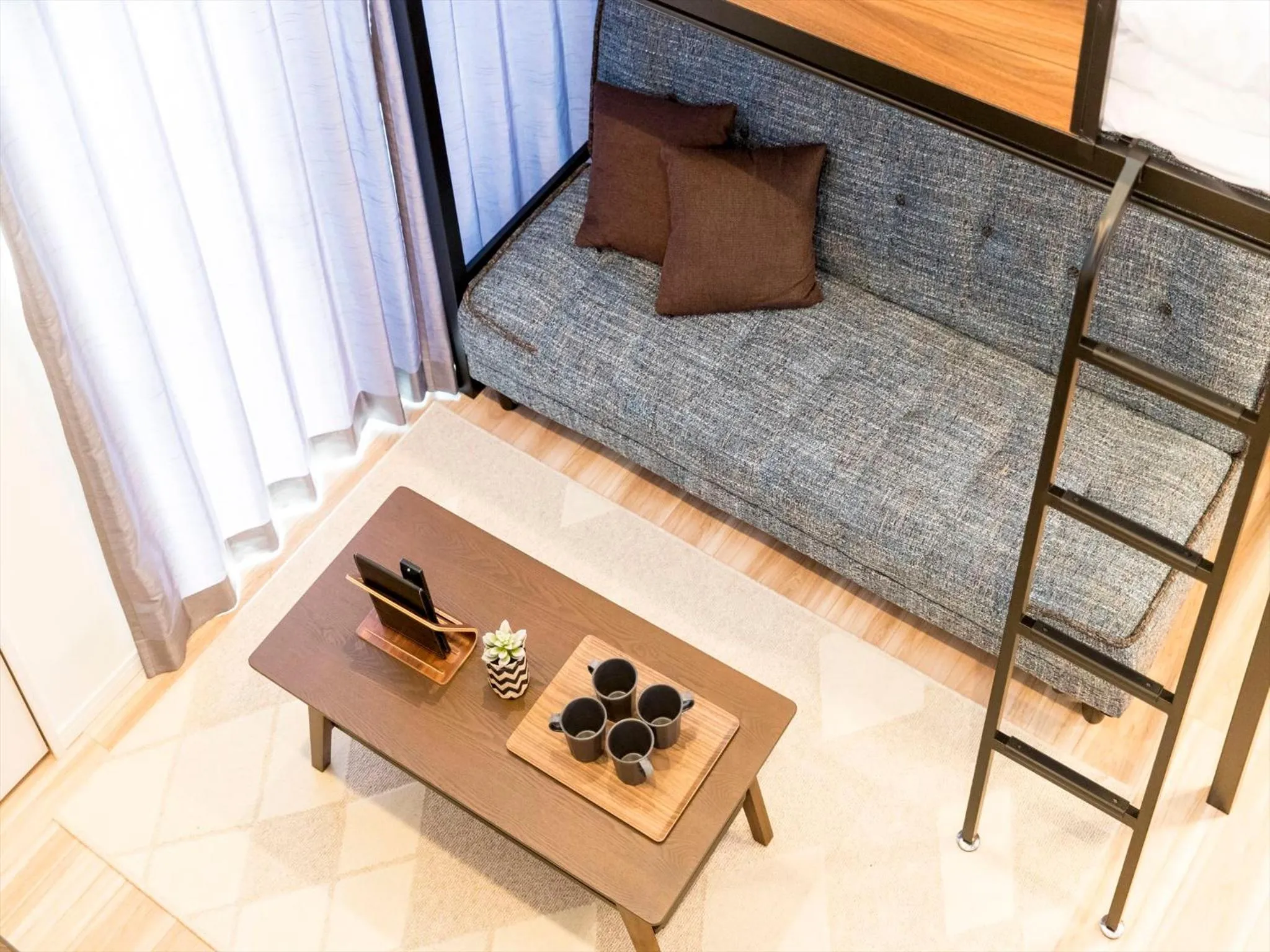 Living room, Bed in TRIP POD MINOSHIMA A