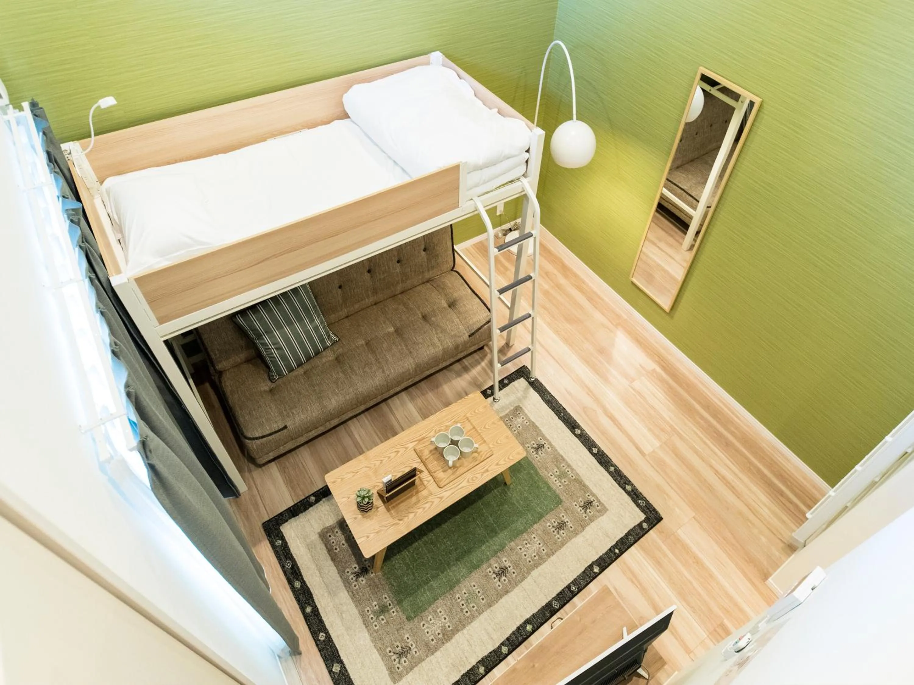 Bed in TRIP POD MINOSHIMA A