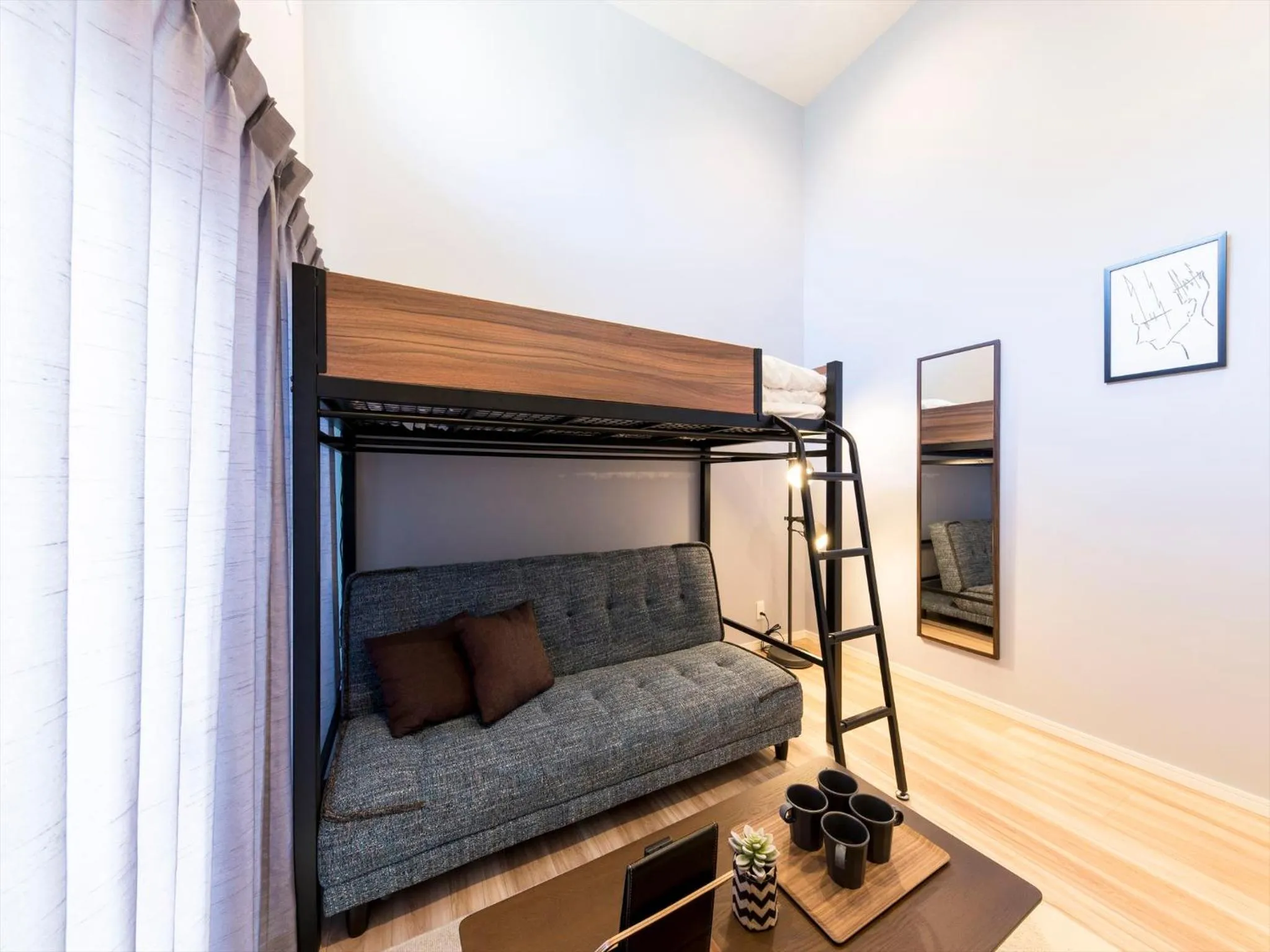 Living room, Bed in TRIP POD MINOSHIMA A