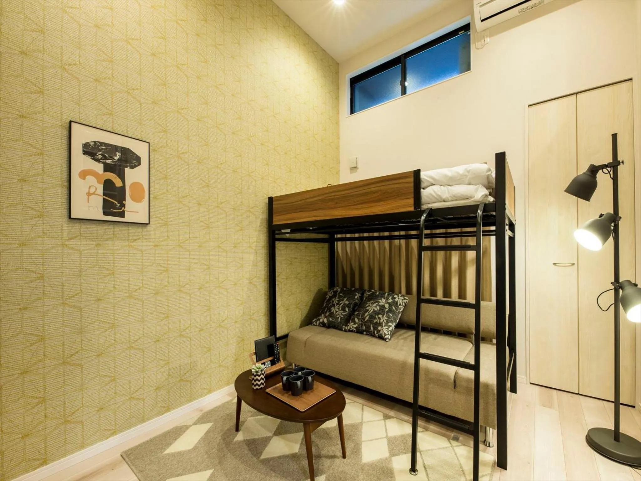 Living room, Bed in TRIP POD SUMIYOSHI B