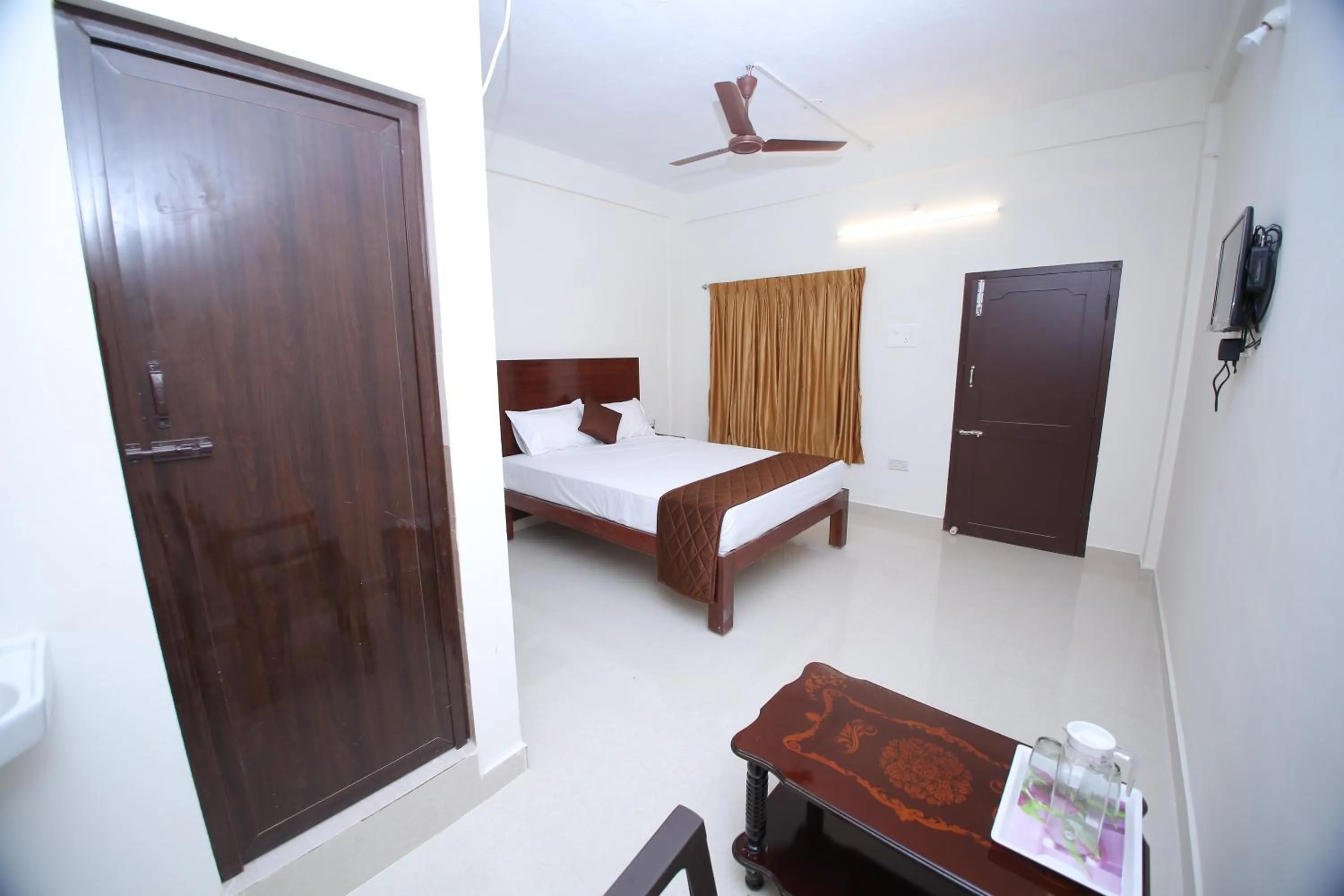 Photo of the whole room, Bed in Rani Residency
