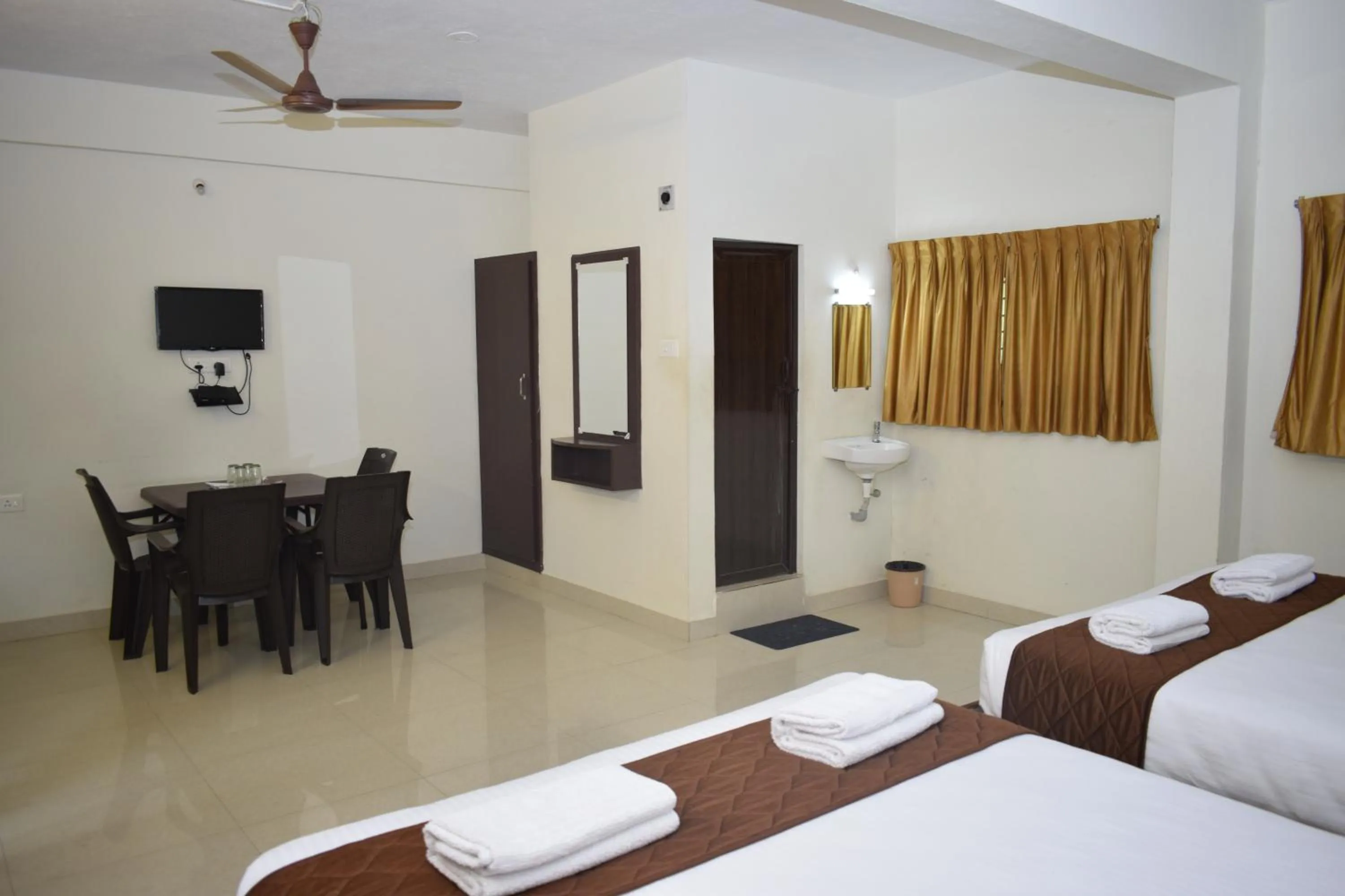 Photo of the whole room, Bed in Rani Residency