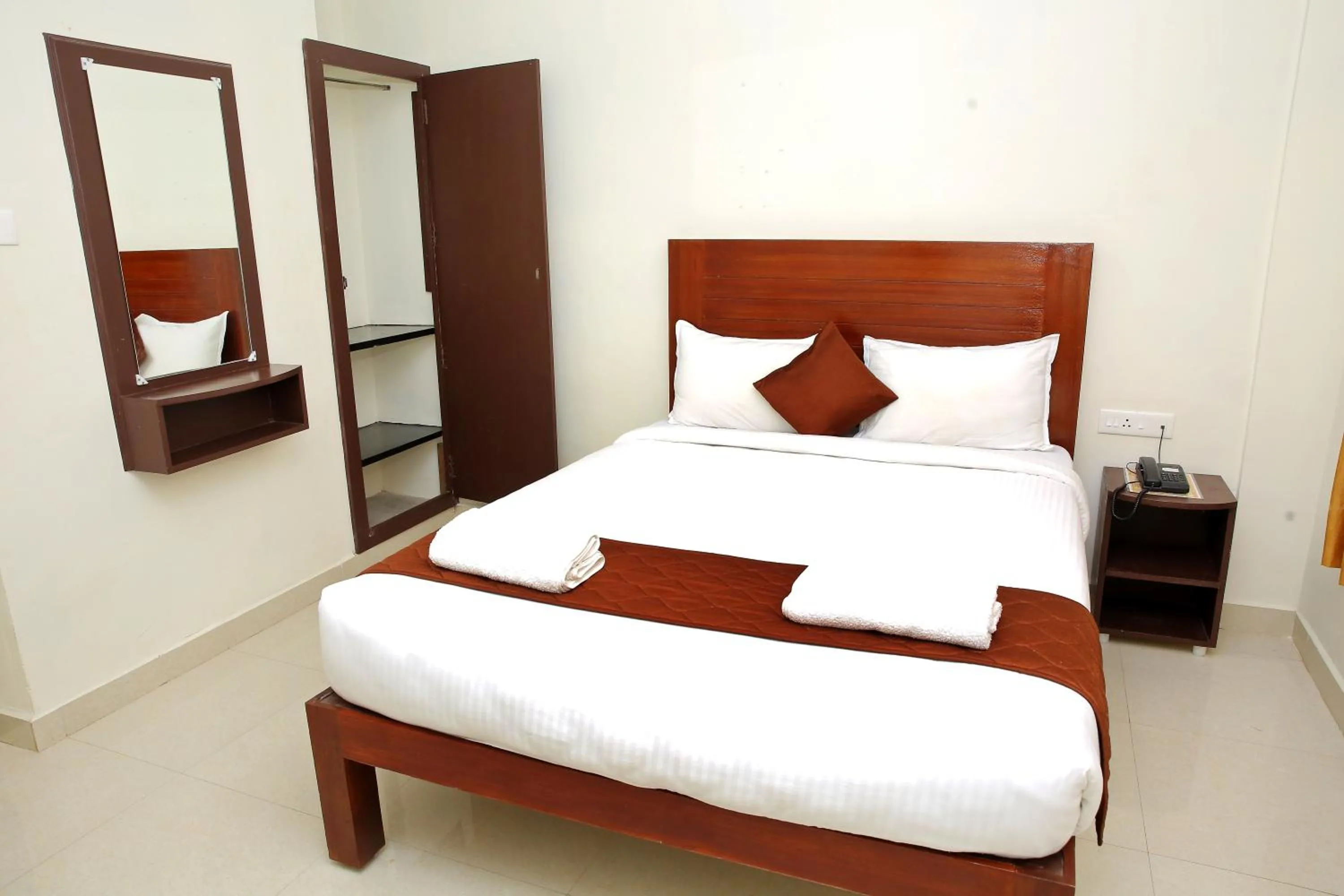 Photo of the whole room, Bed in Rani Residency