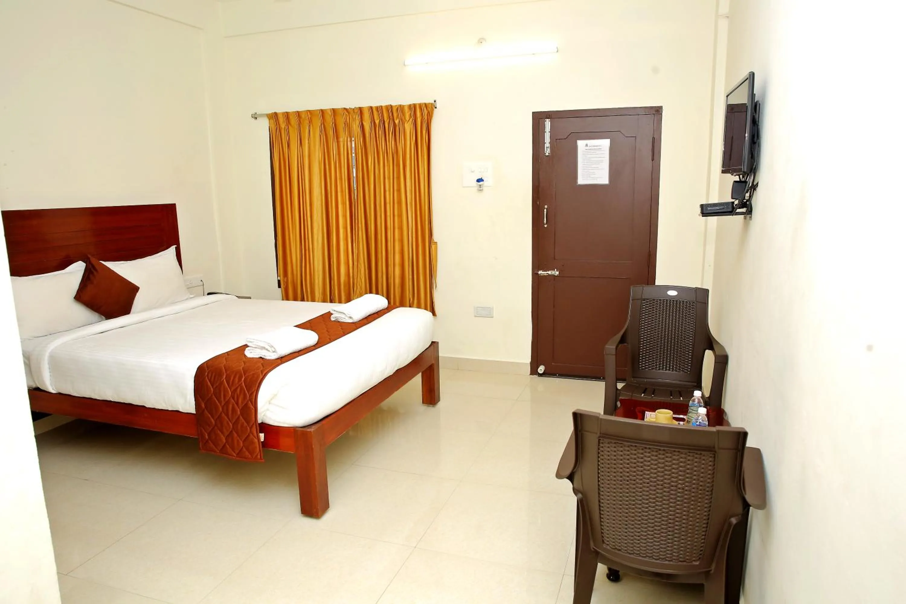 Photo of the whole room, Bed in Rani Residency