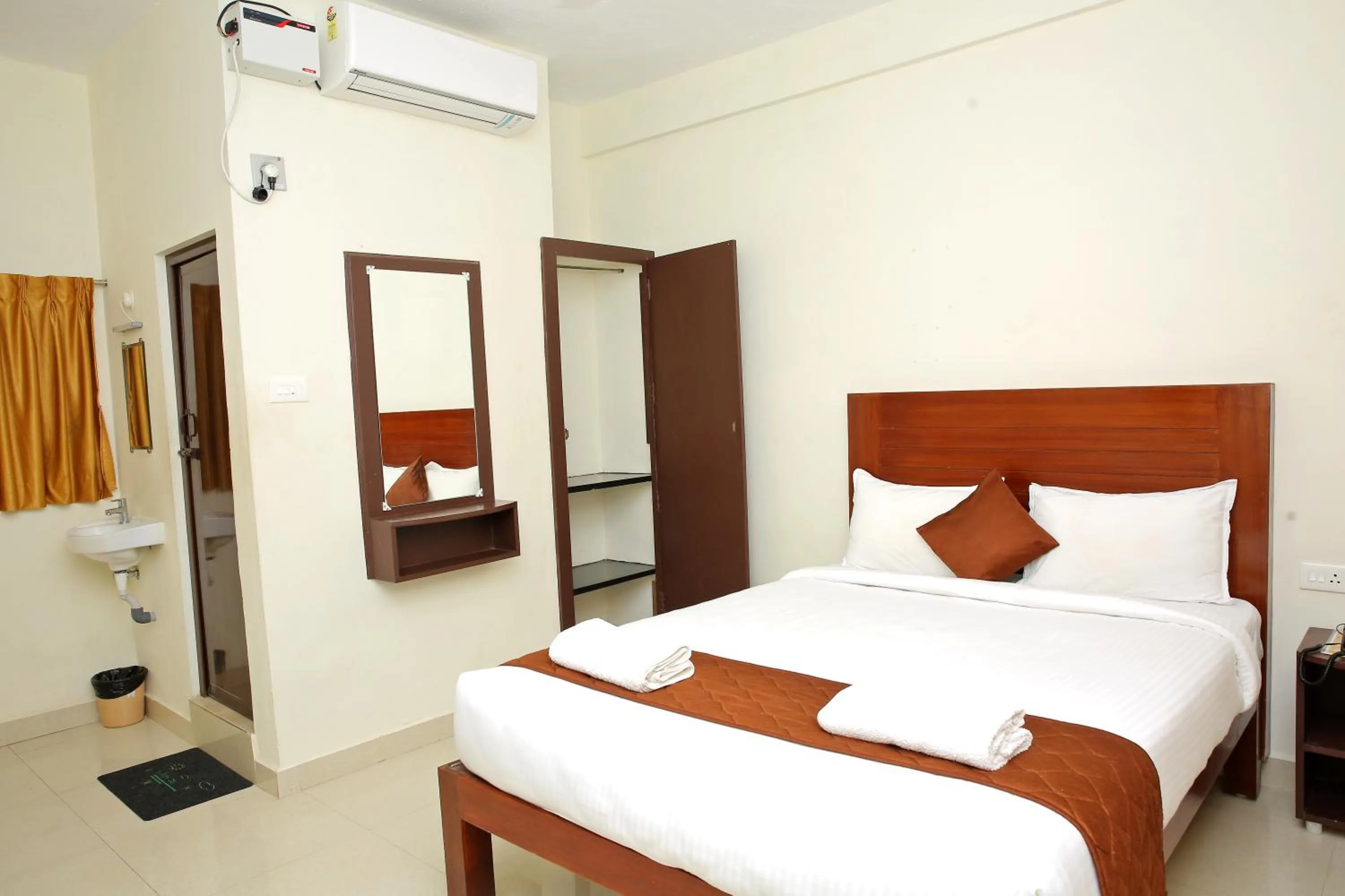 Photo of the whole room, Bed in Rani Residency