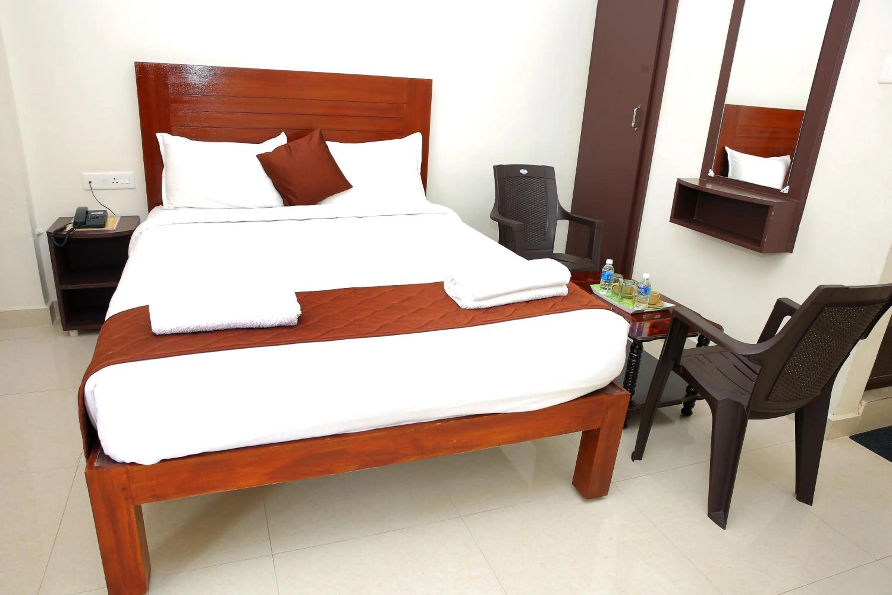 Photo of the whole room, Bed in Rani Residency