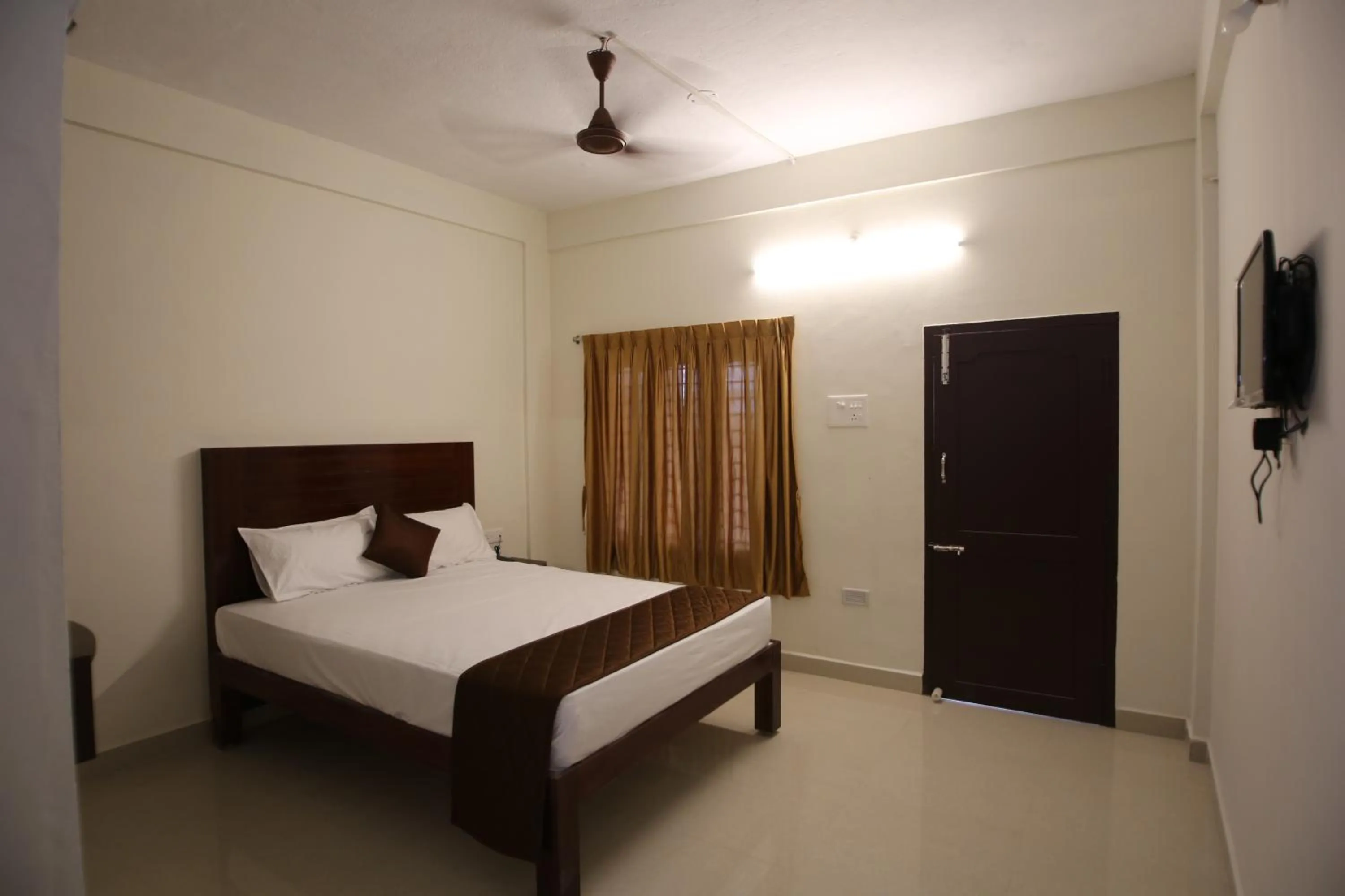 Photo of the whole room, Bed in Rani Residency