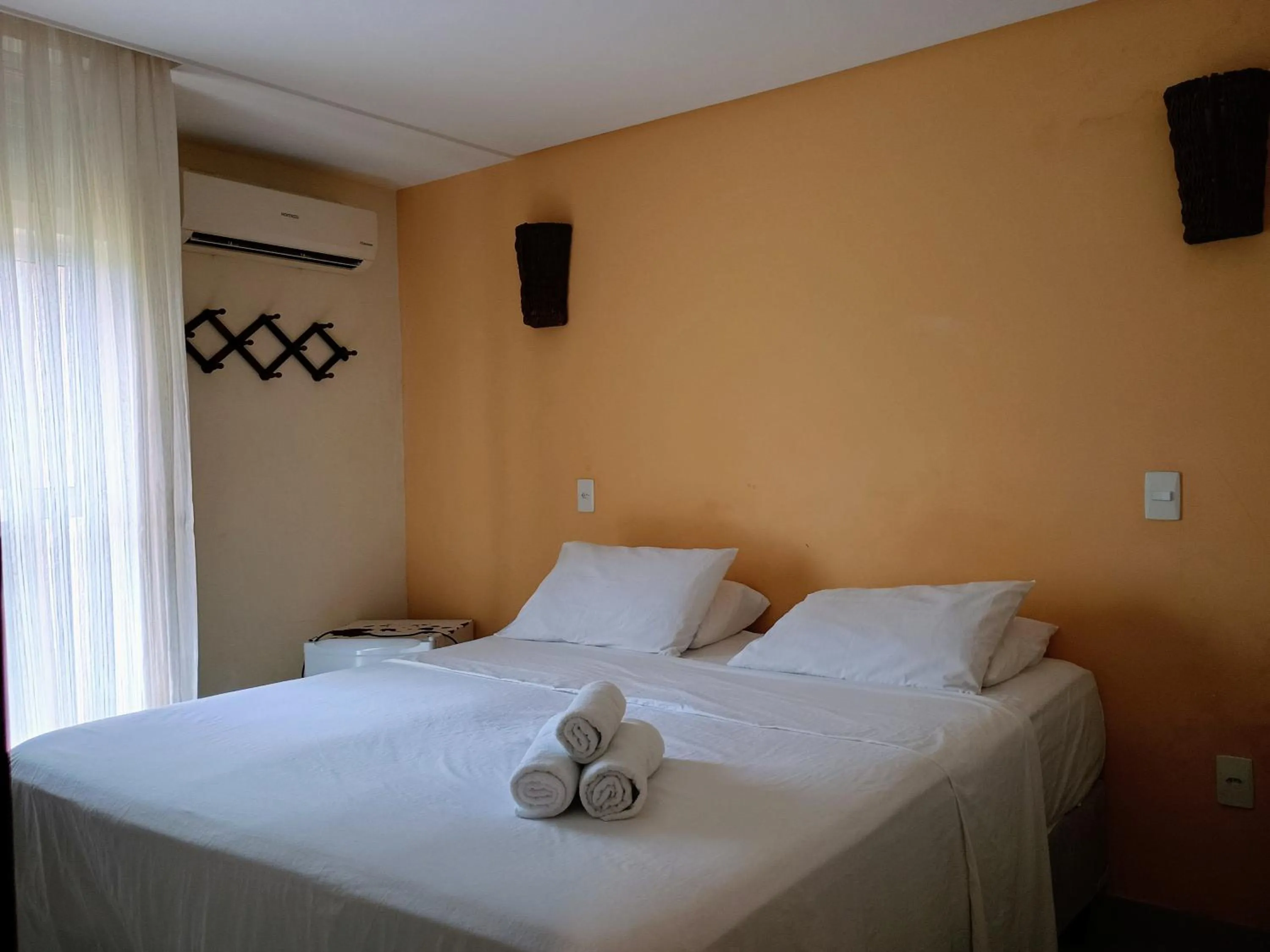 Photo of the whole room, Bed in Pousada Laguna