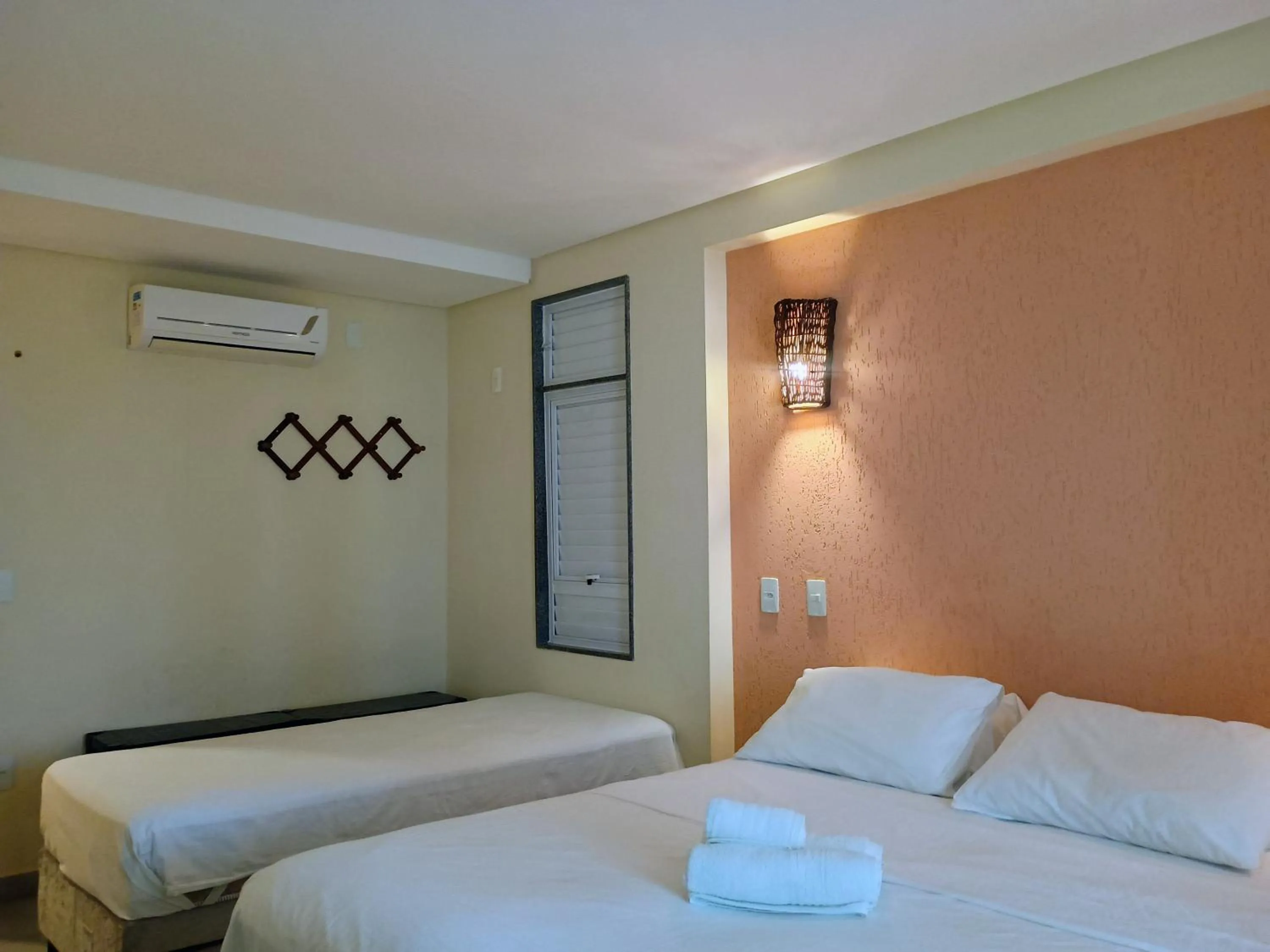 Photo of the whole room, Bed in Pousada Laguna