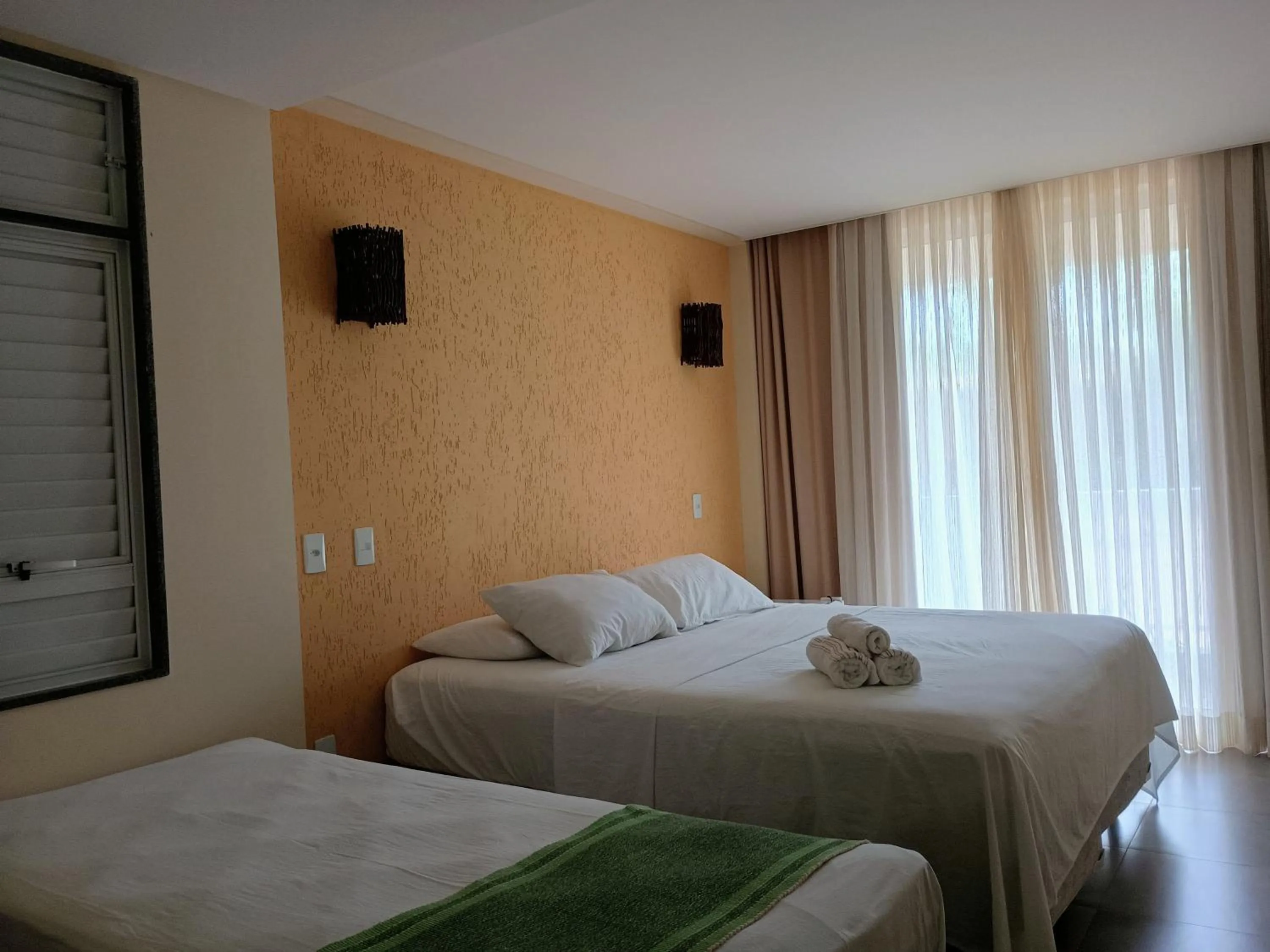 Photo of the whole room, Bed in Pousada Laguna