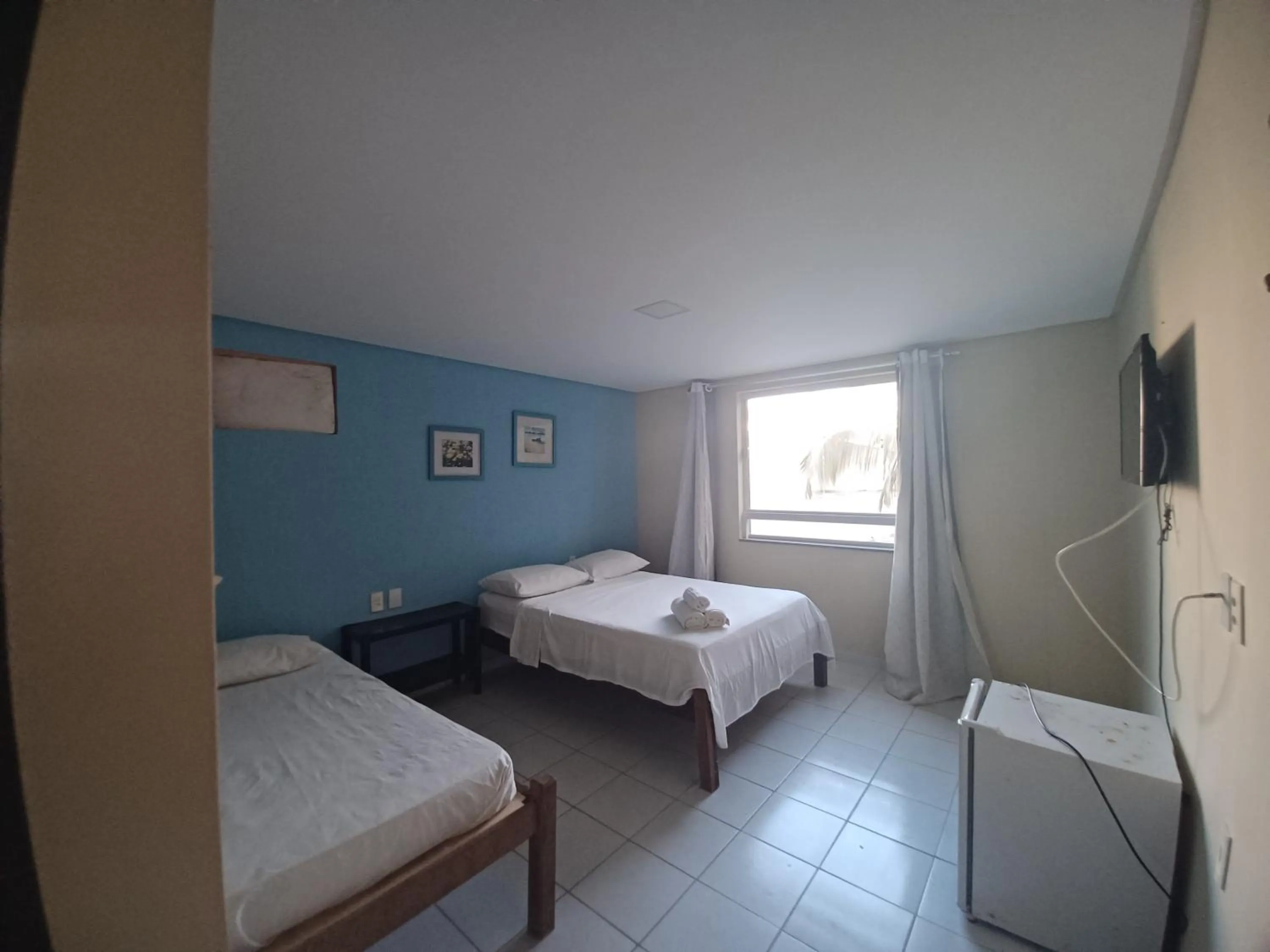 Bed in Pousada Laguna