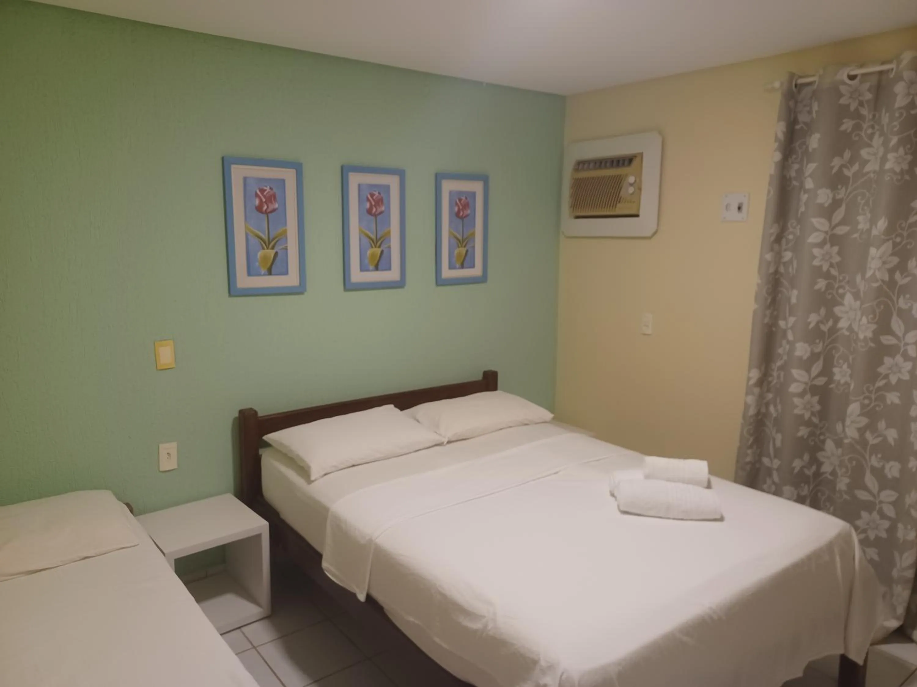 Bed in Pousada Laguna