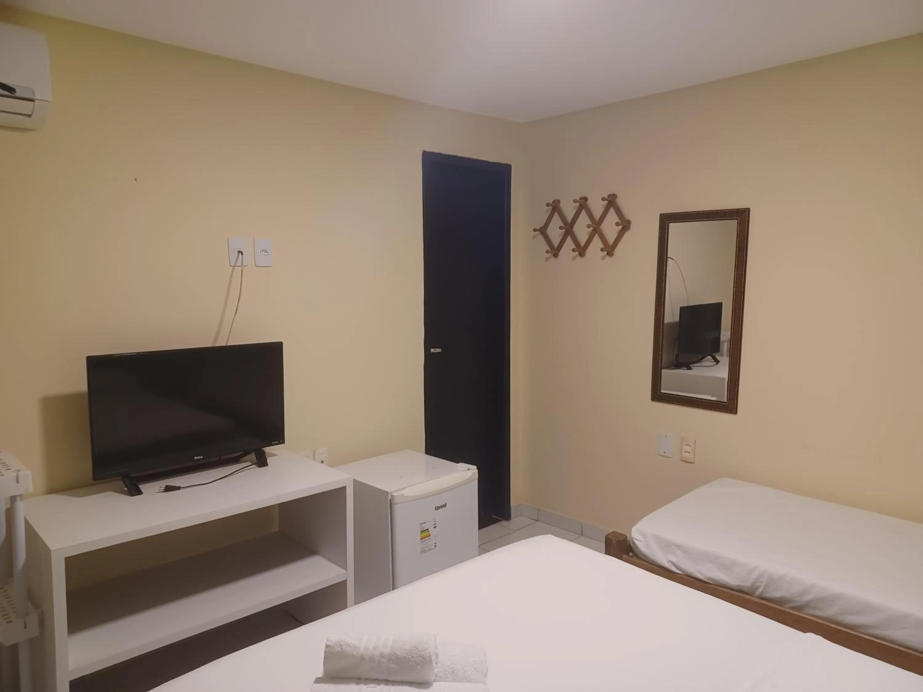 Bed in Pousada Laguna