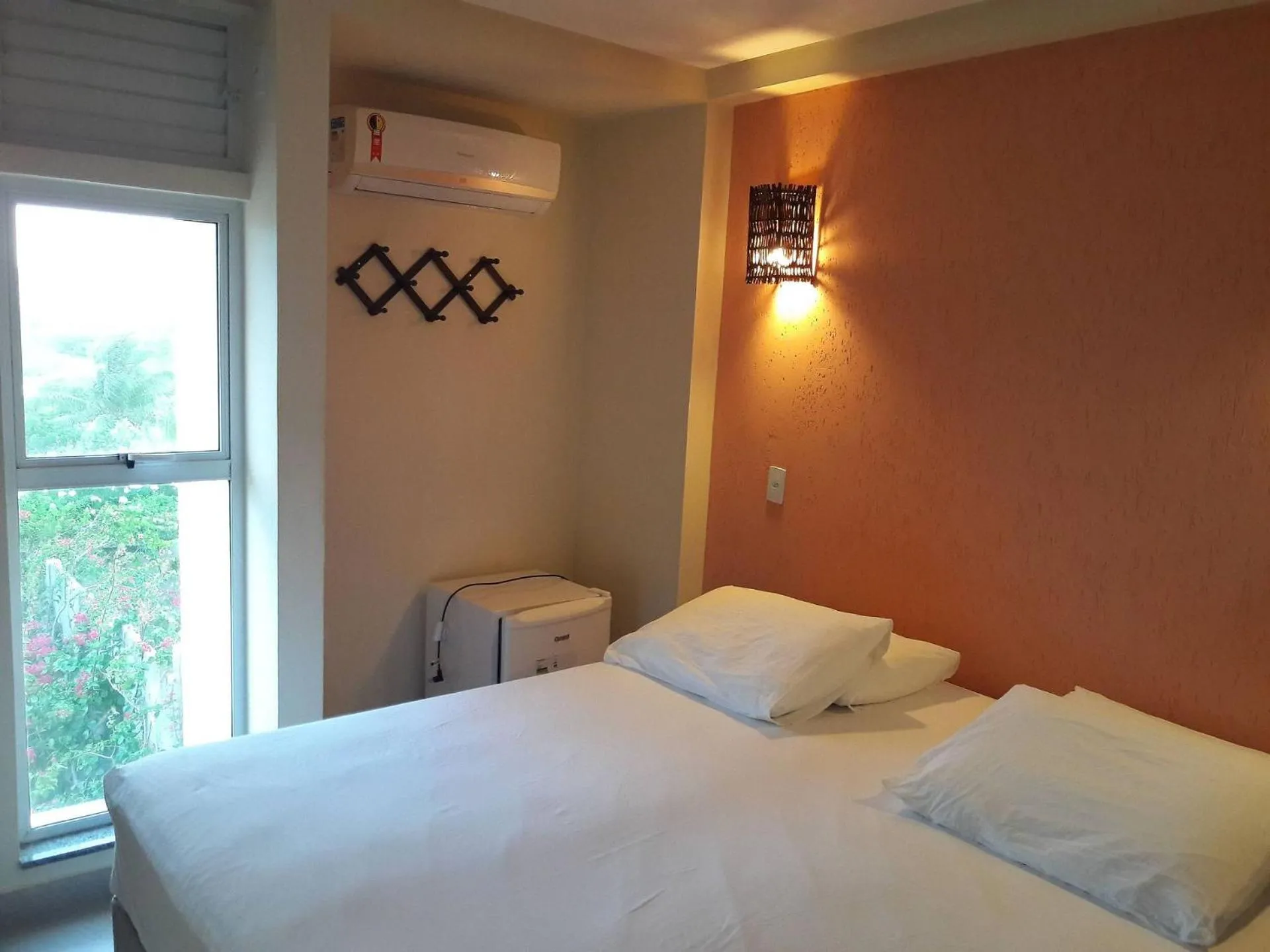 Bed in Pousada Laguna