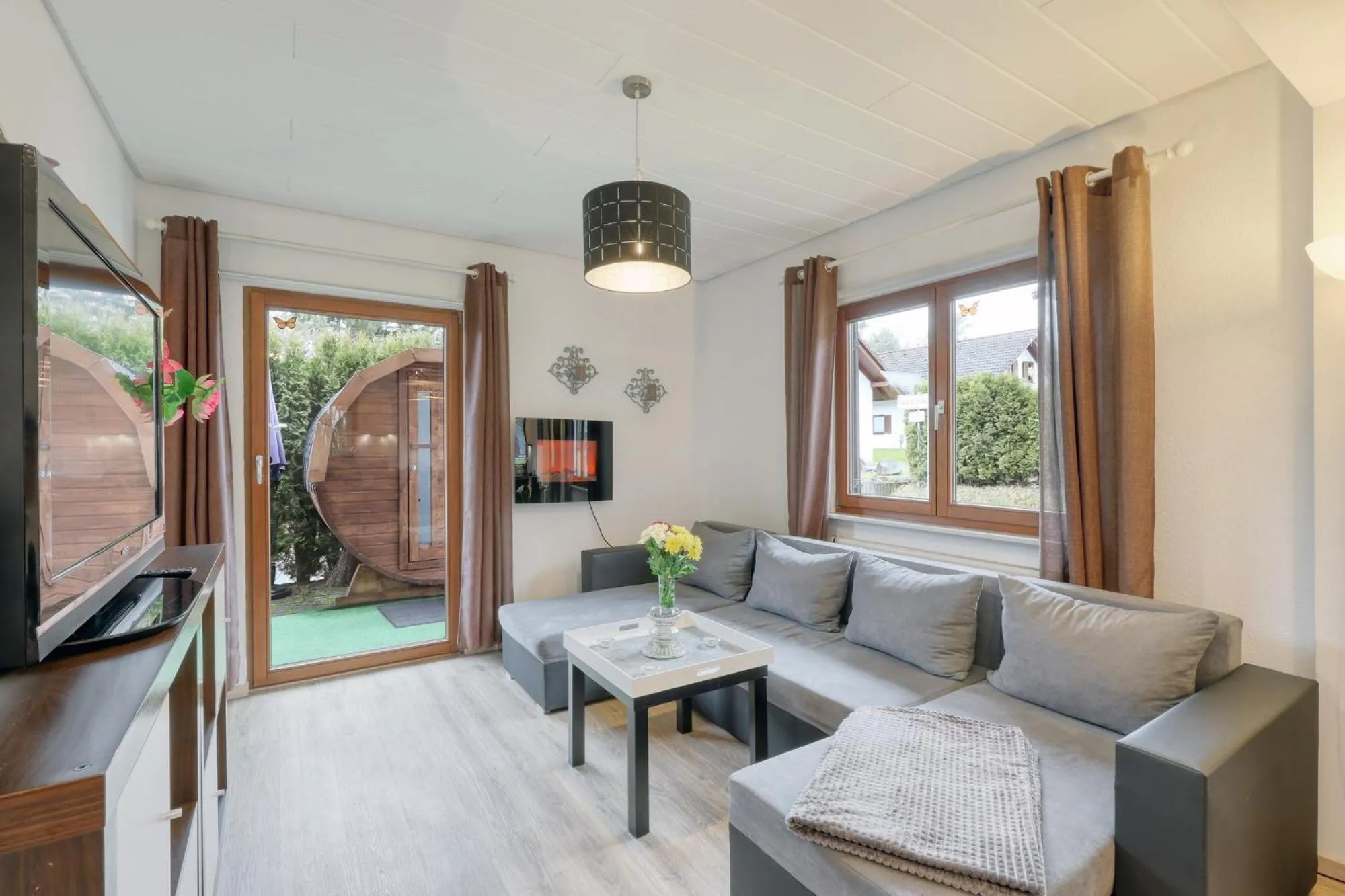 Communal lounge/ TV room in Seepark Kirchheim Ferienhaus bei Diane mit Sauna