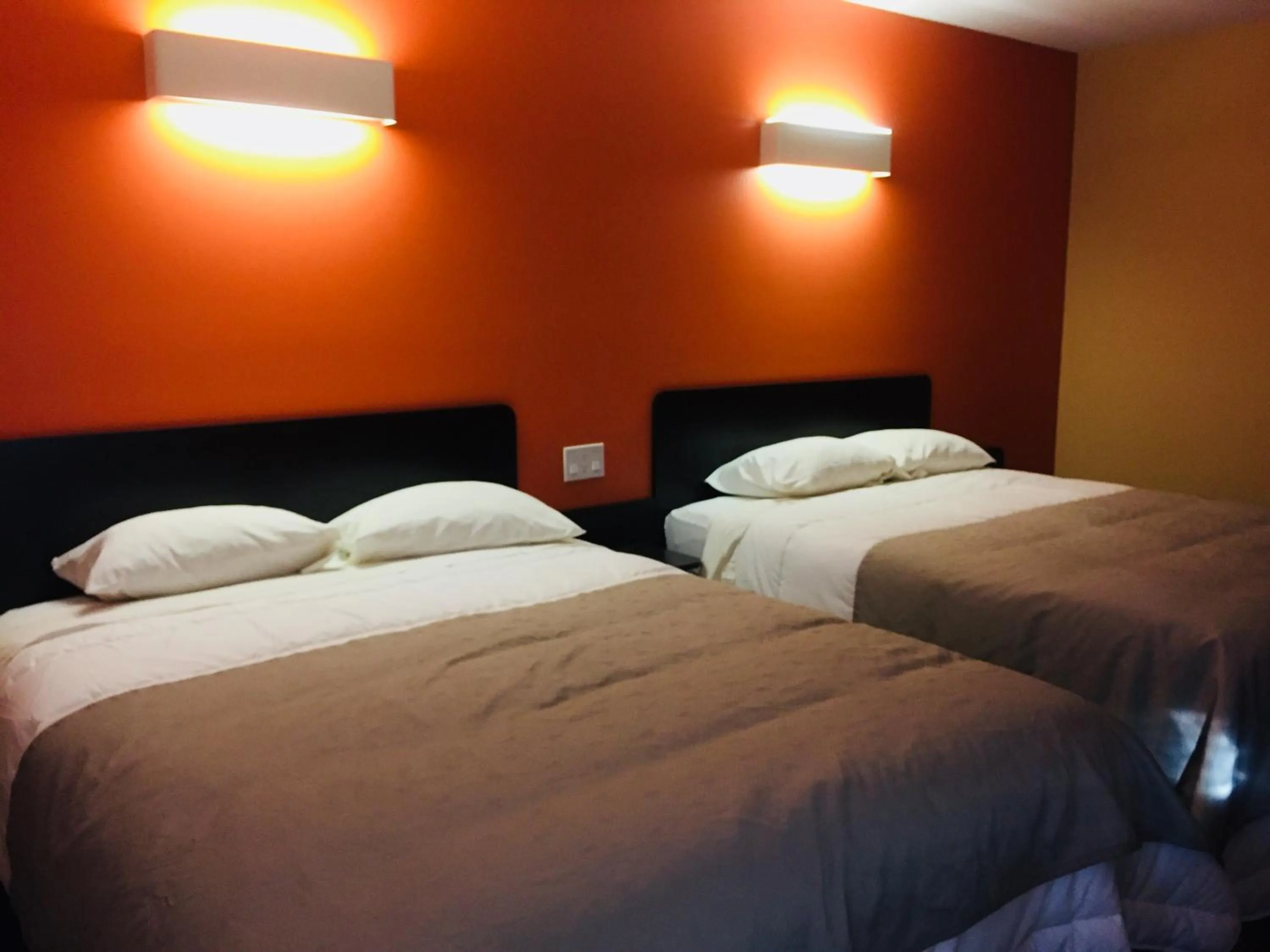 Bed in Riverside Motel Cache Creek