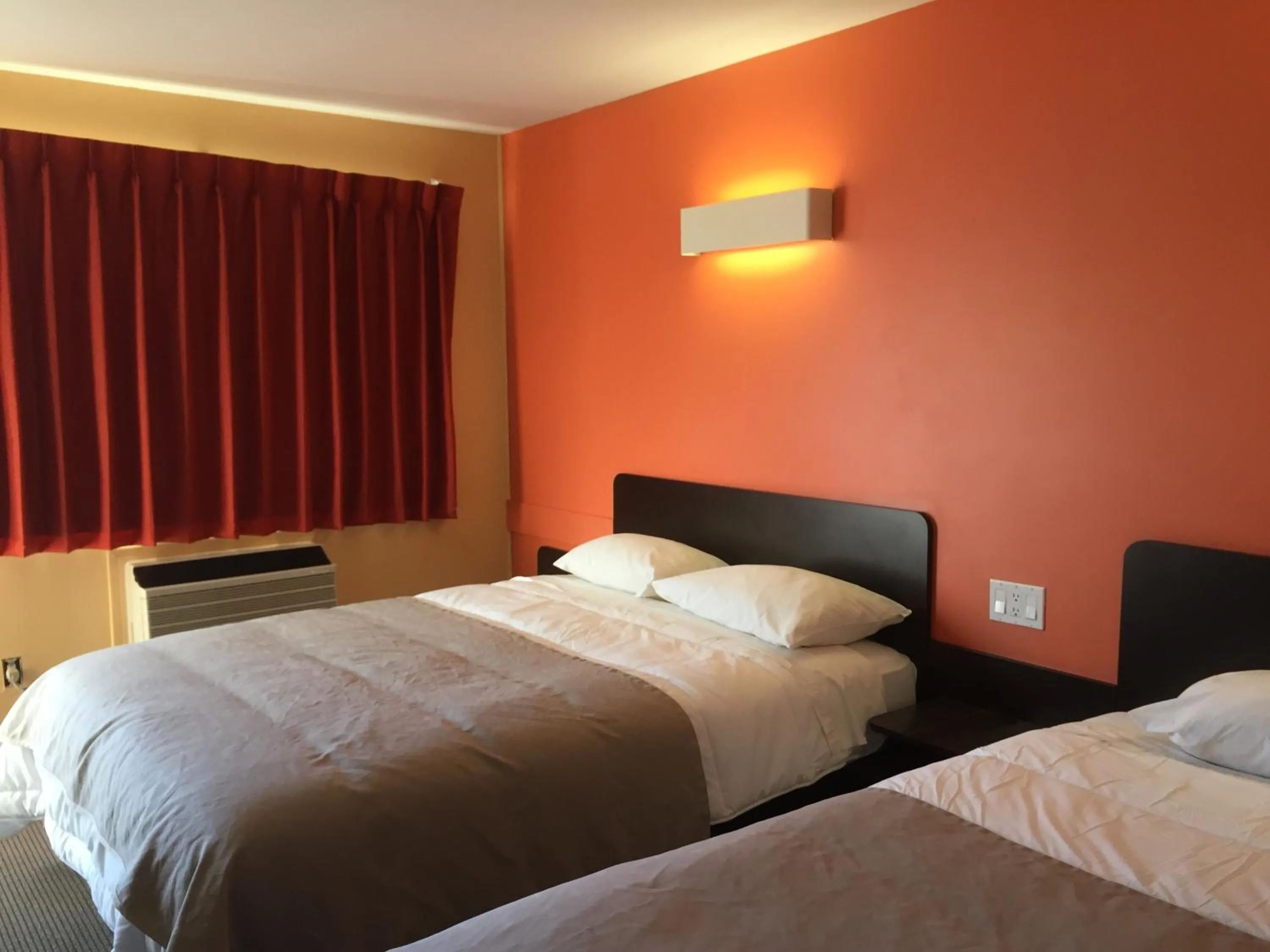 Bed in Riverside Motel Cache Creek