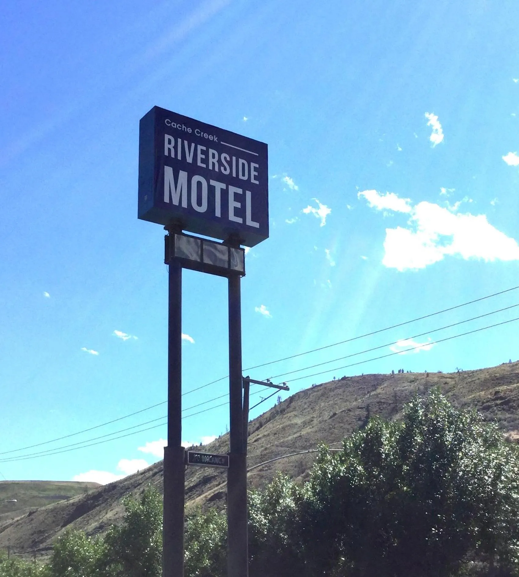 Property logo or sign in Riverside Motel Cache Creek