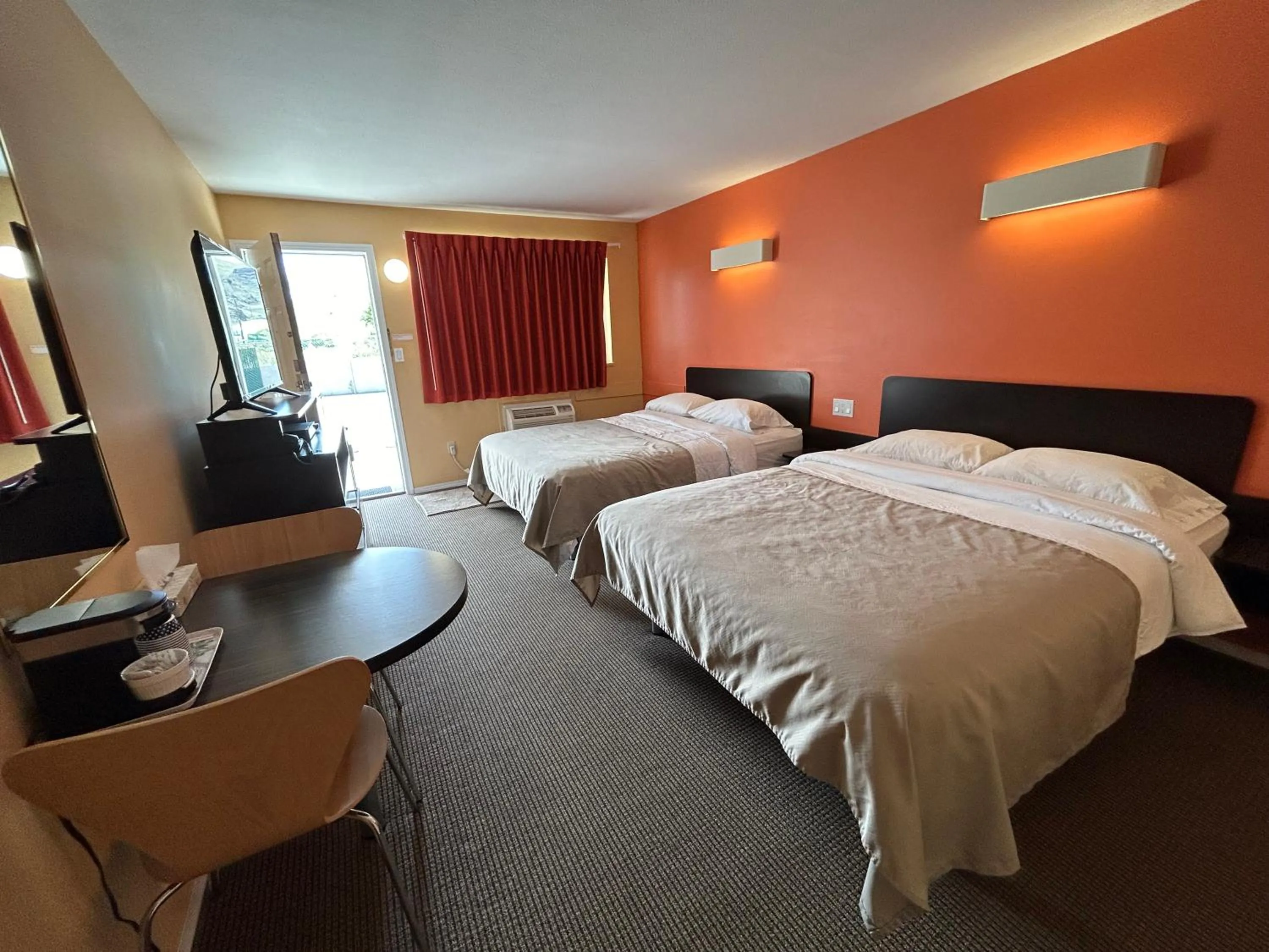 Bed in Riverside Motel Cache Creek