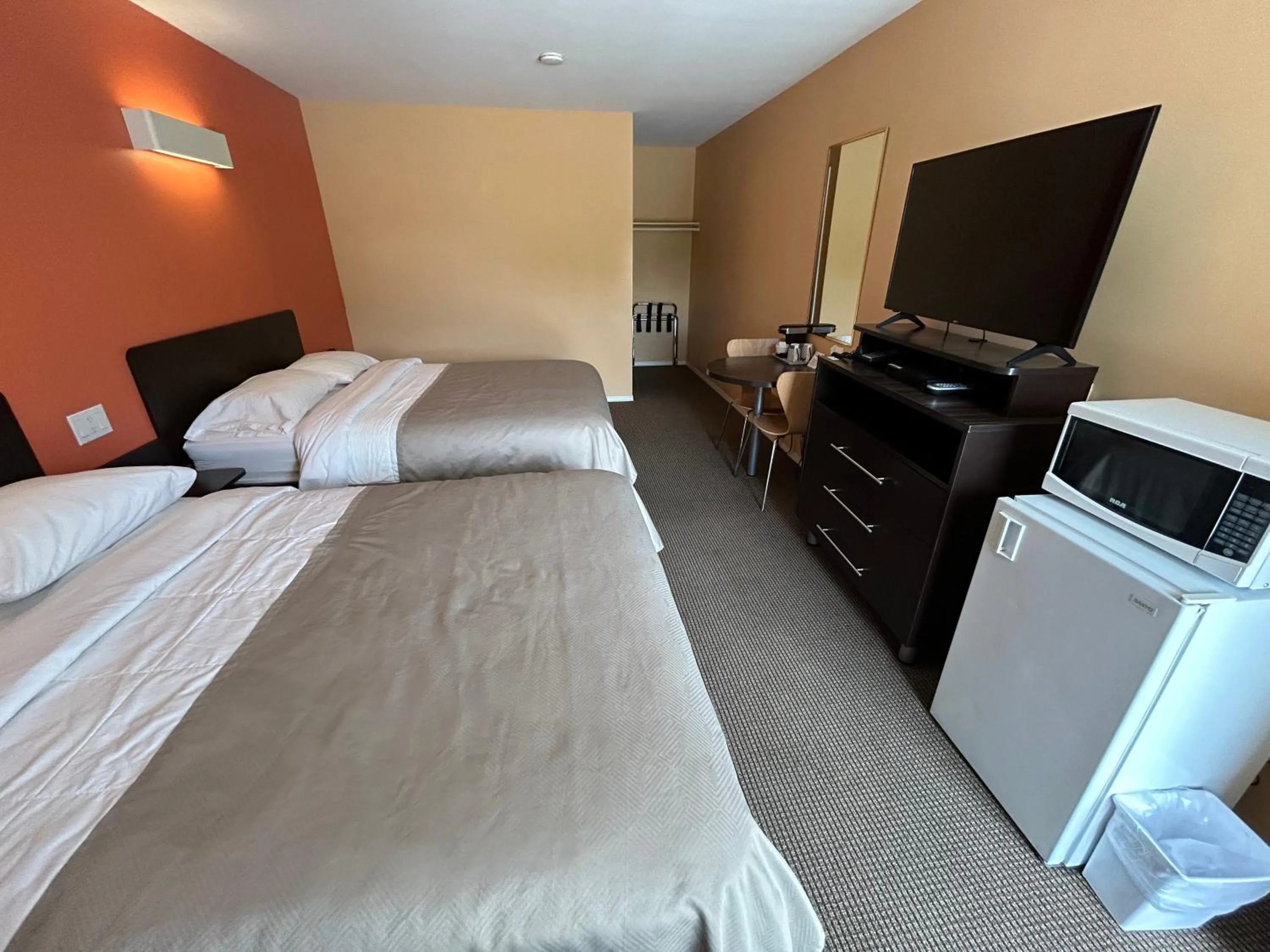 Bed in Riverside Motel Cache Creek