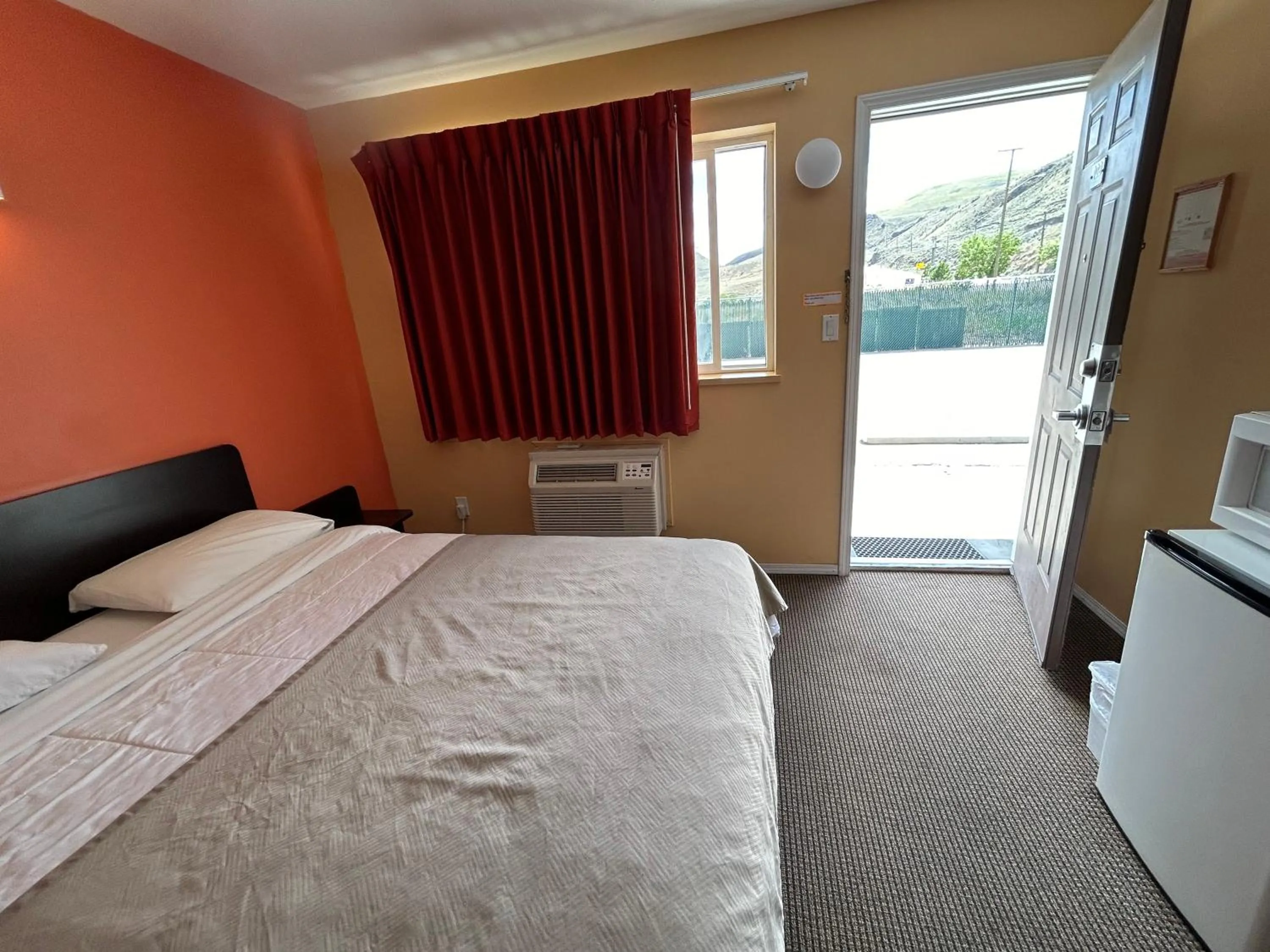 Bed in Riverside Motel Cache Creek