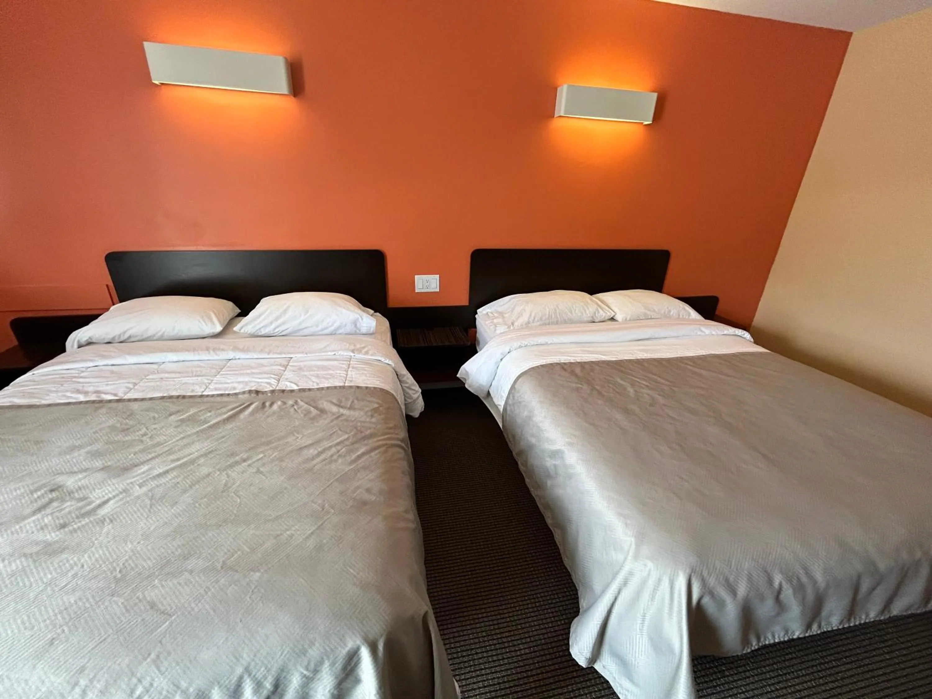 Bed in Riverside Motel Cache Creek