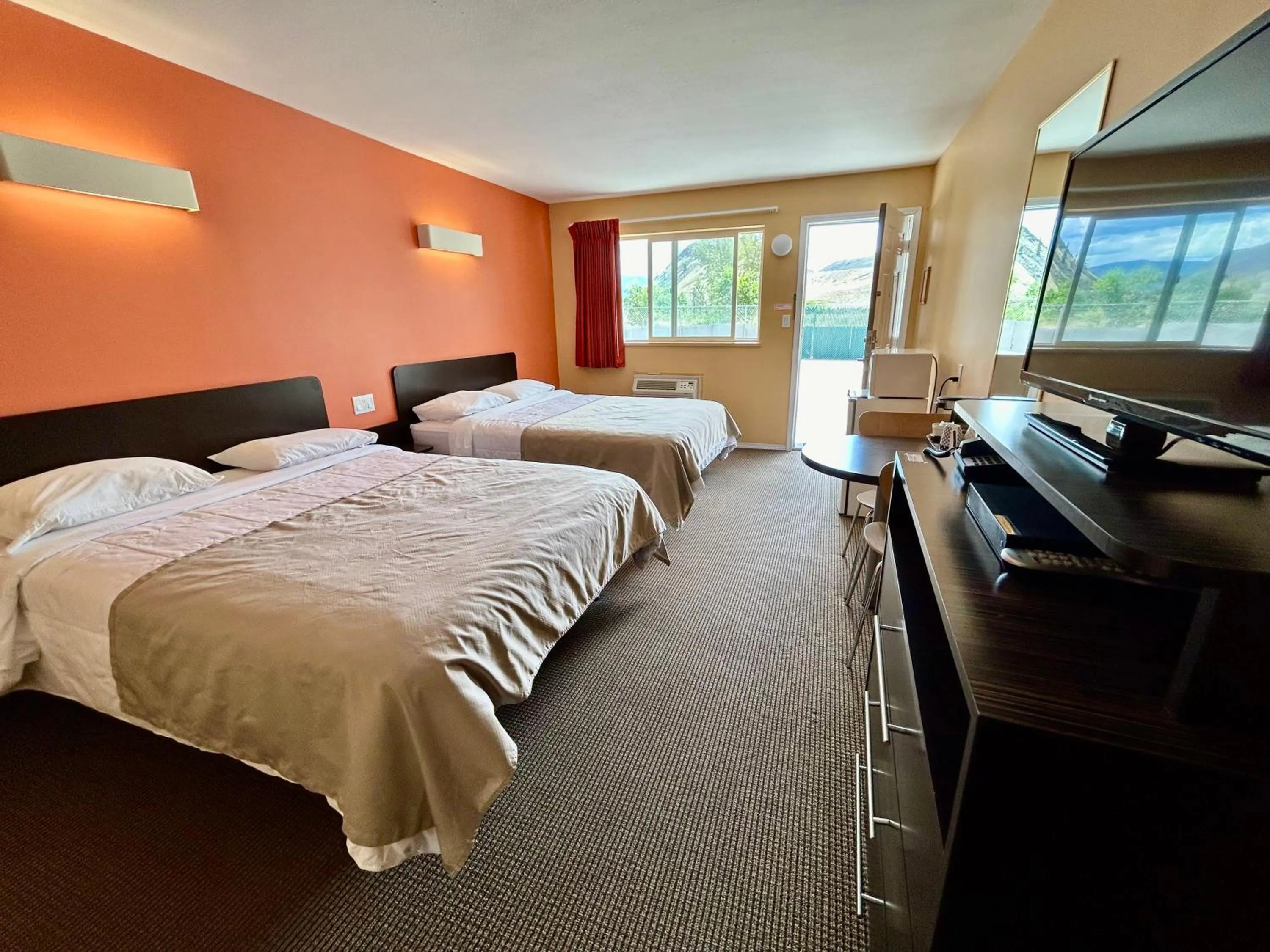 Bed in Riverside Motel Cache Creek