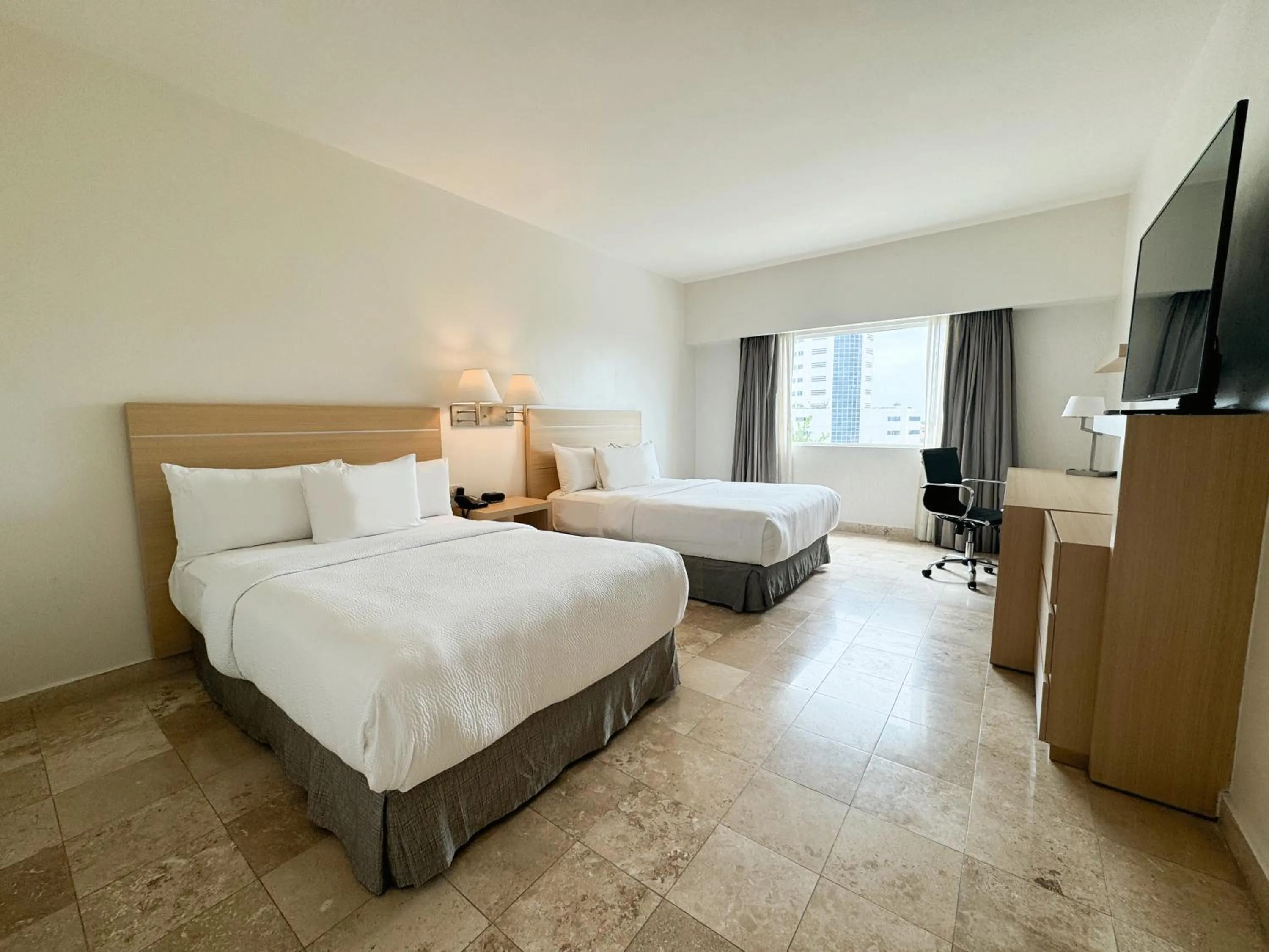 Communal lounge/ TV room, Bed in Courtyard by Marriott Villahermosa Tabasco