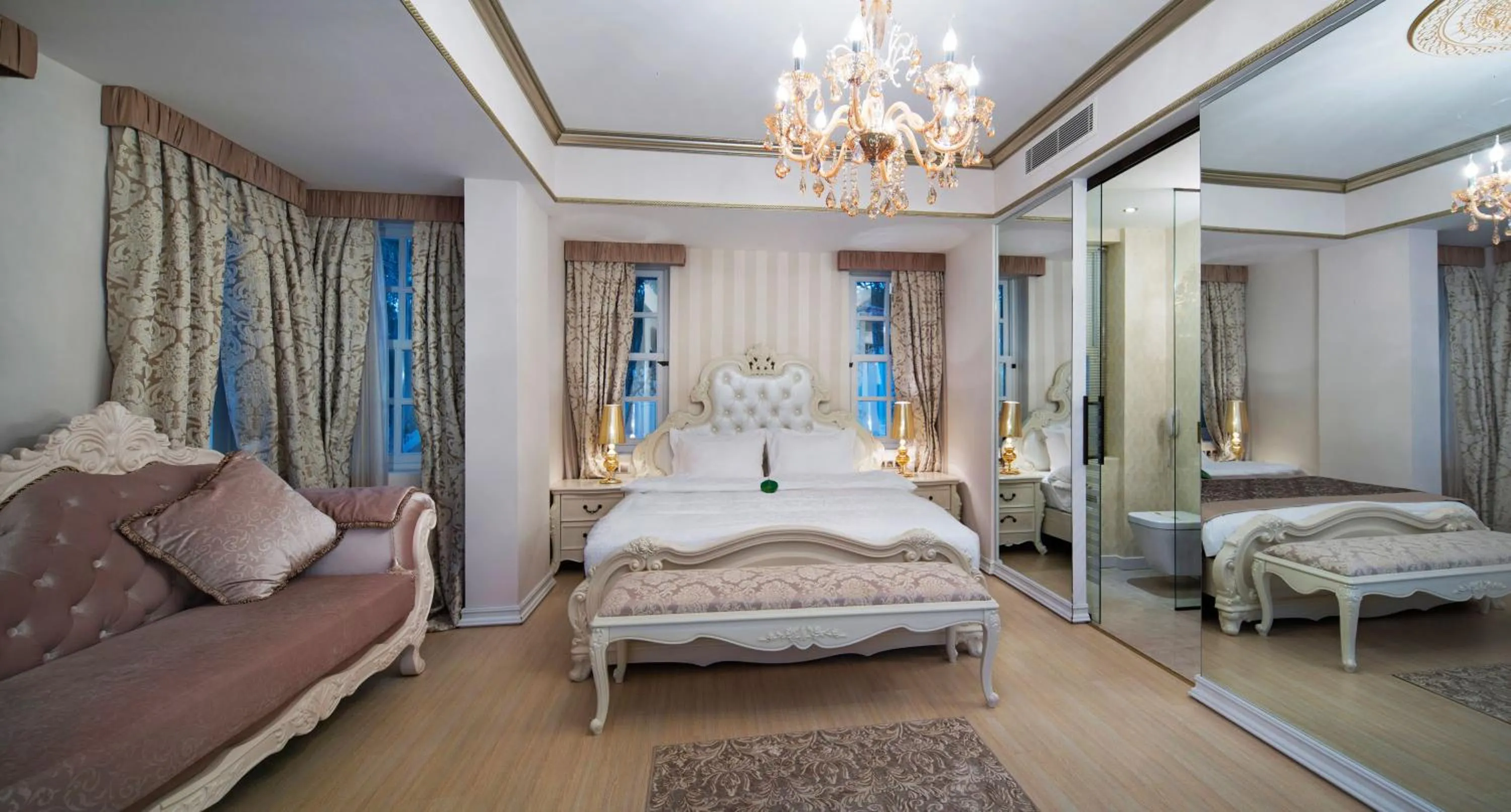 Bed in Elegance East Hotel