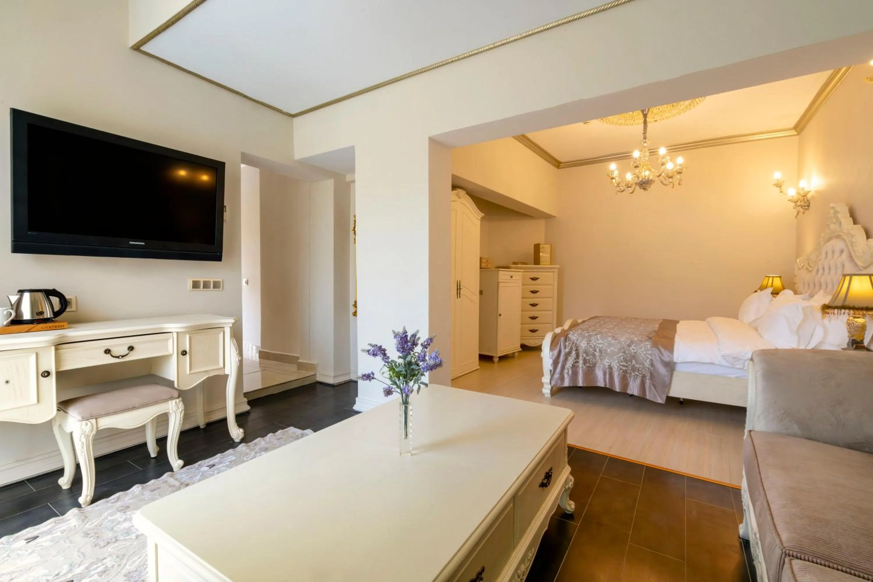 Bed in Elegance East Hotel