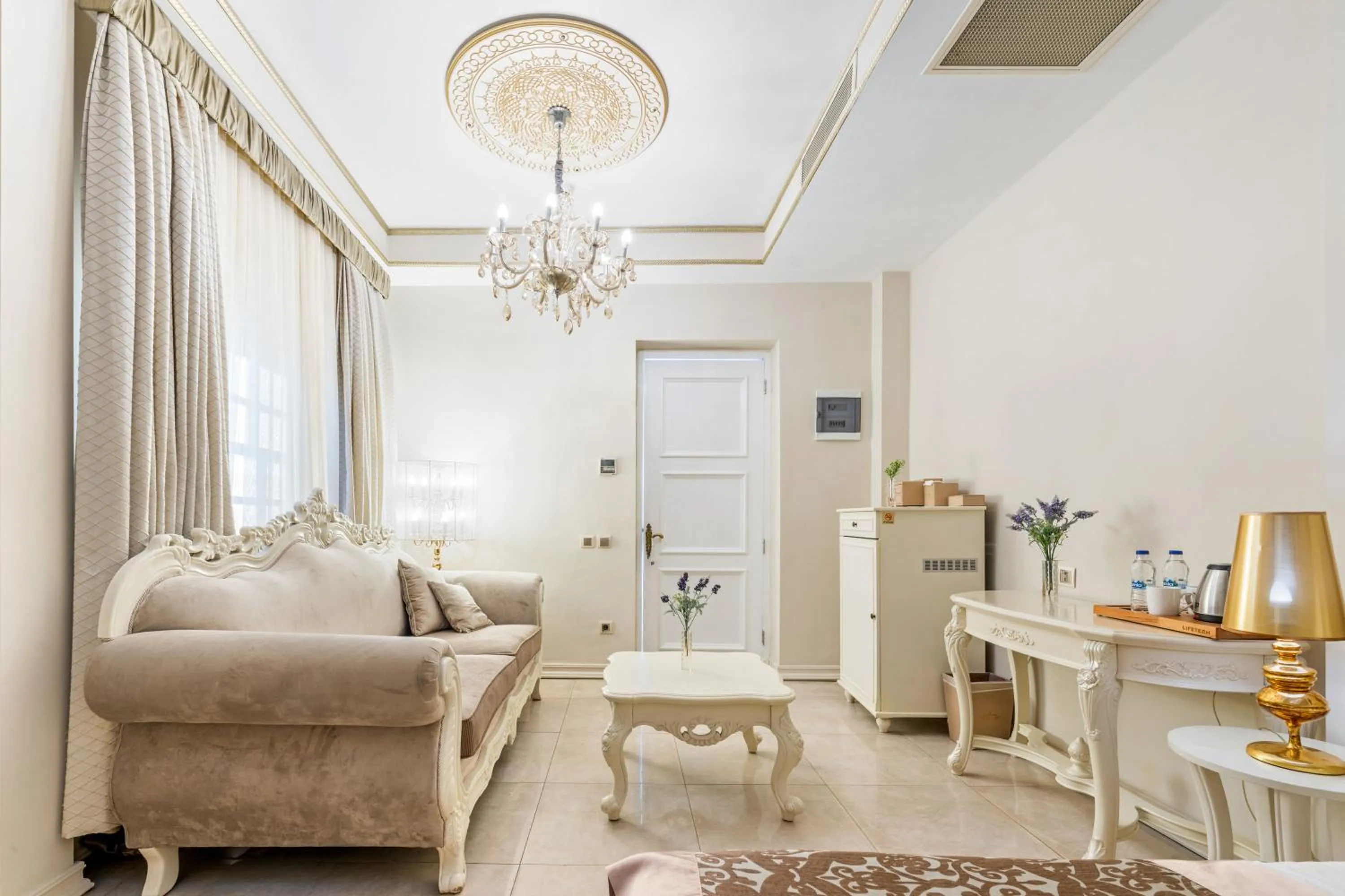 Seating area in Elegance East Hotel