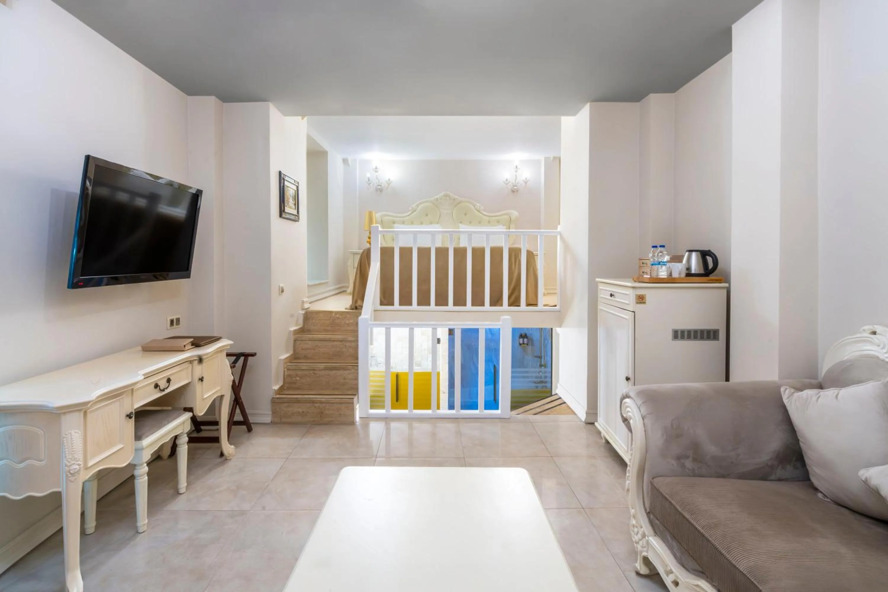 Bed in Elegance East Hotel