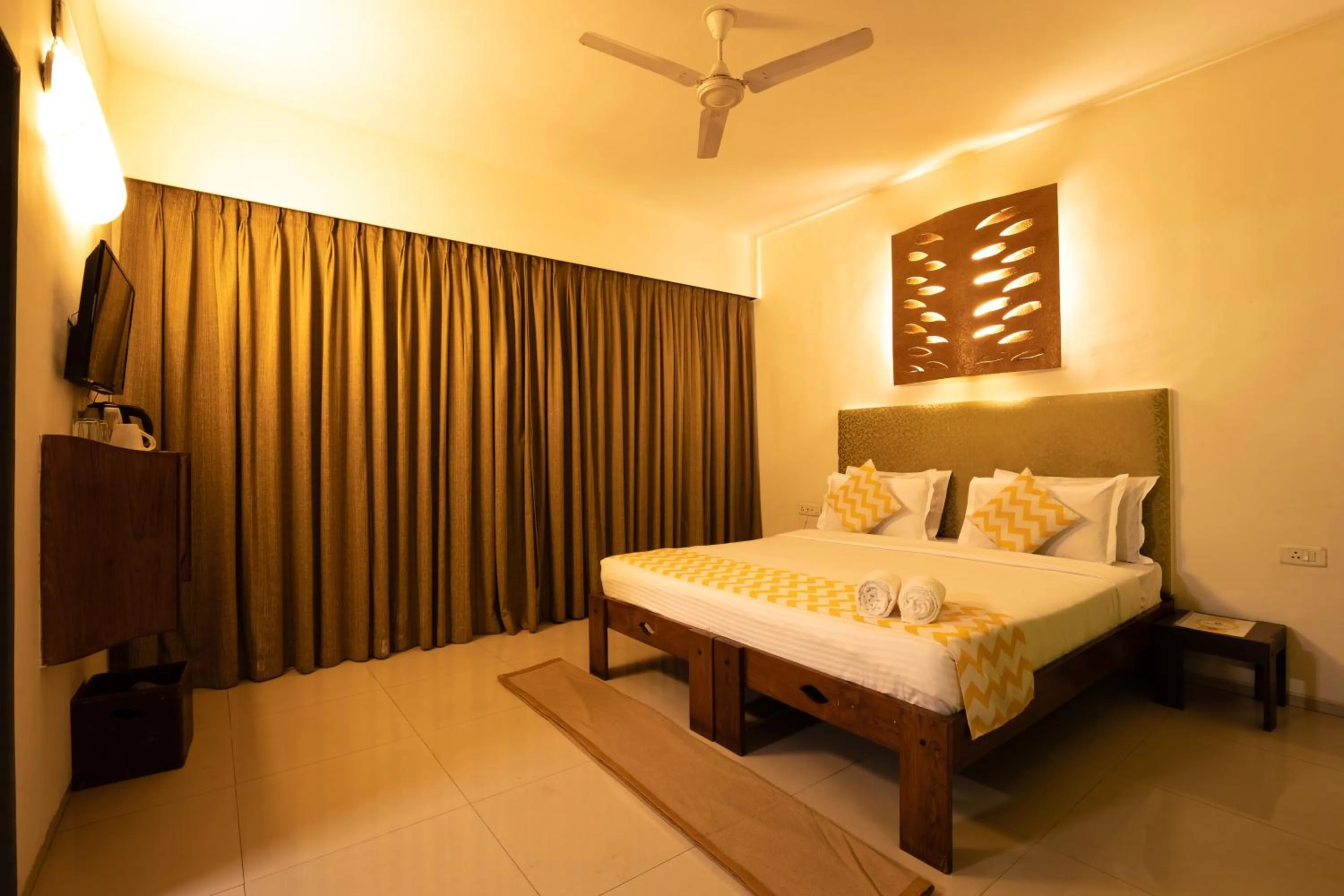 Bed in Sharanam Green Resort