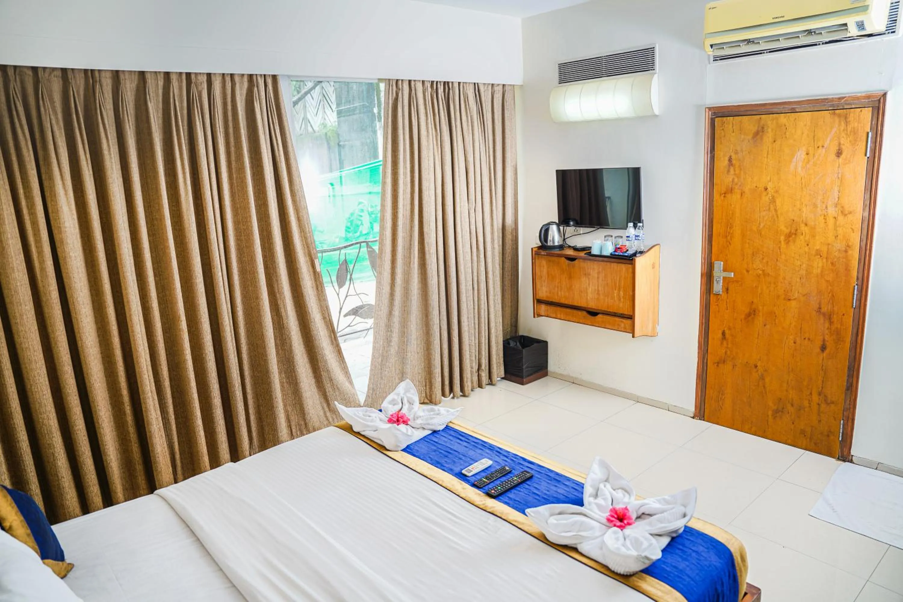 Bed in Sharanam Green Resort